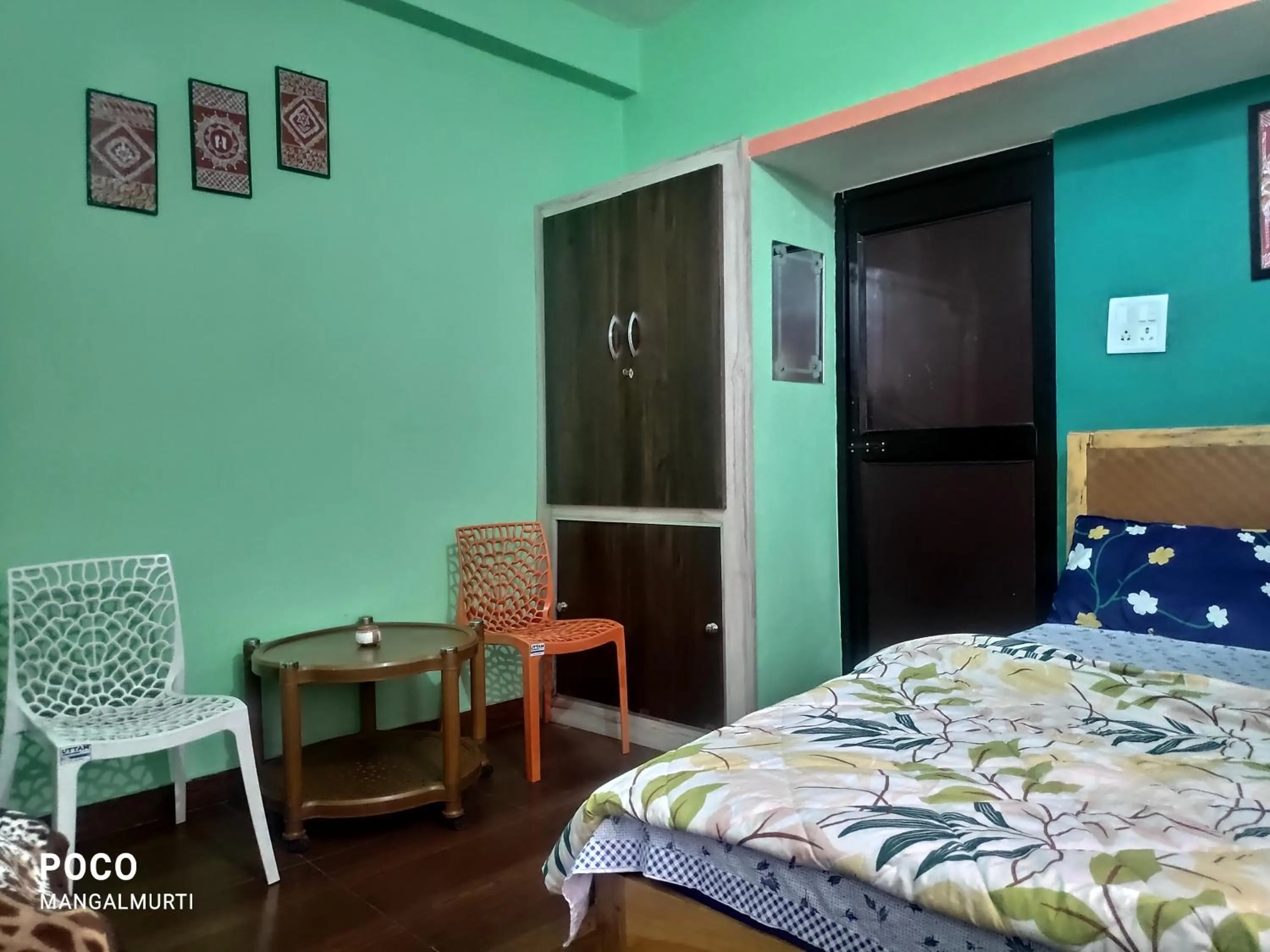 Bed in MangalMurti Himalyan Hotel