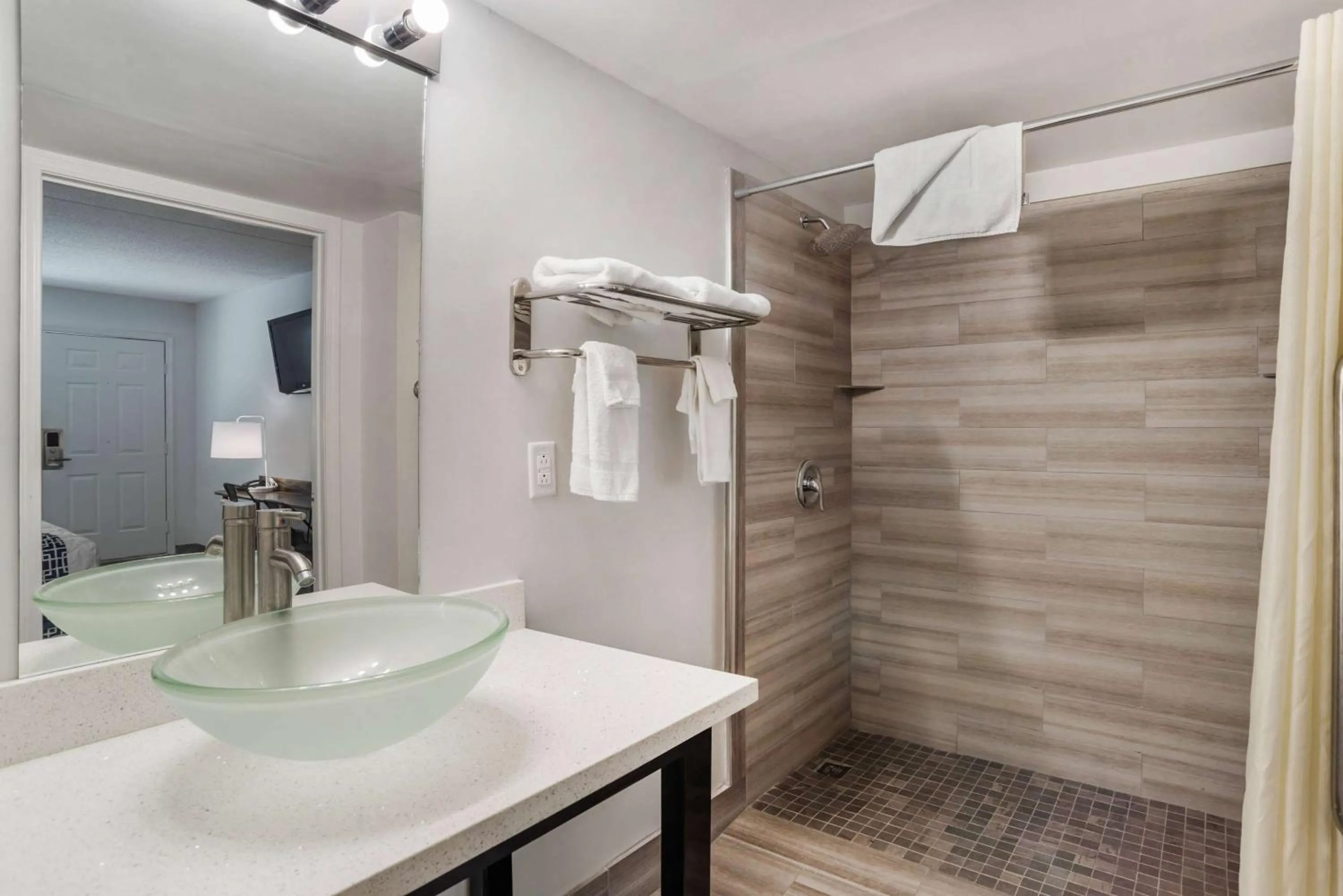 Bathroom in Super 8 by Wyndham Daleville-Fort Novosel