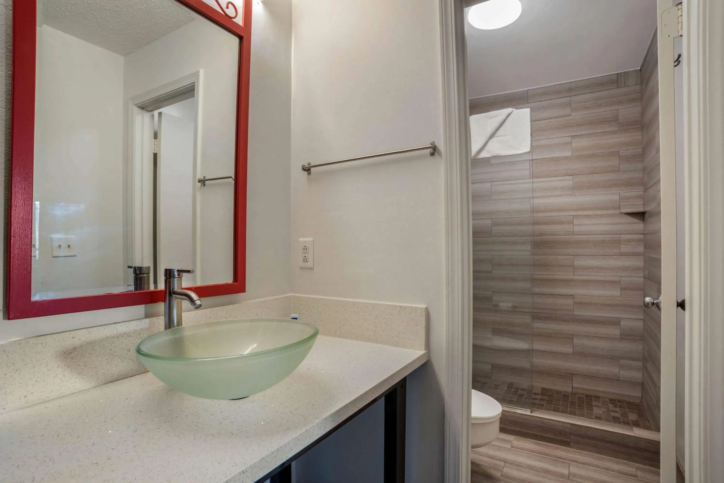 Bathroom in Super 8 by Wyndham Daleville-Fort Novosel