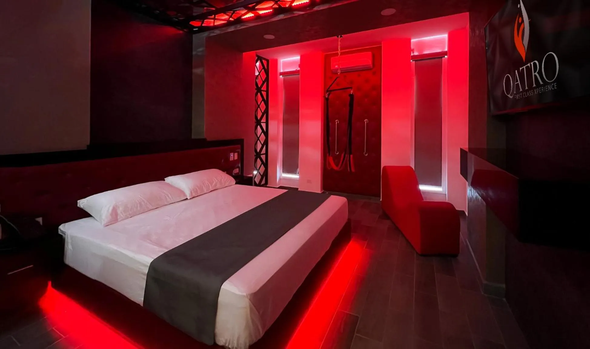 Decorative detail, Bed in Motel Boutique Qatro