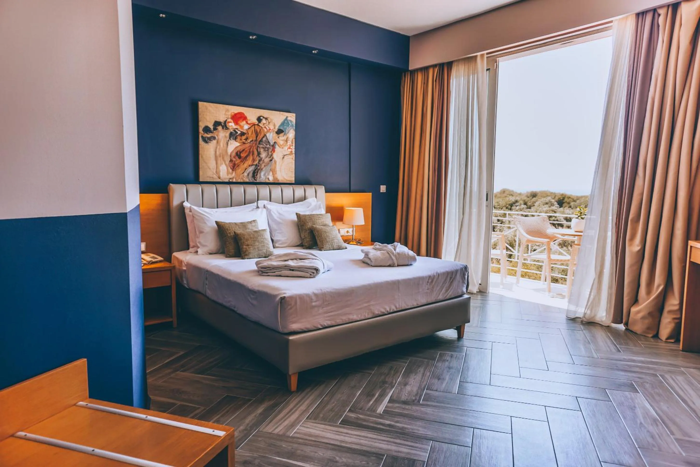 Bed in Apollo Resort Art Hotel