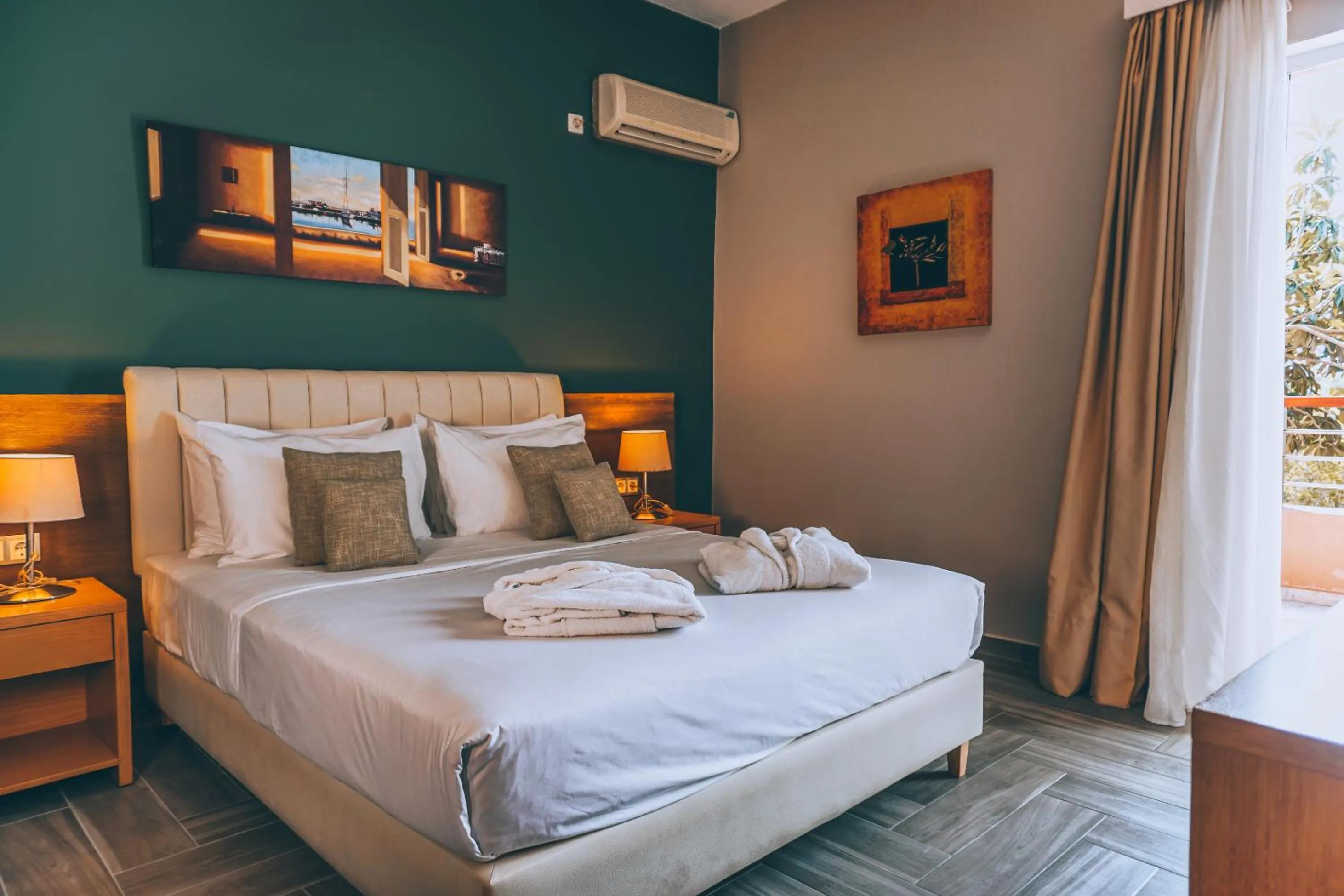 Bed in Apollo Resort Art Hotel