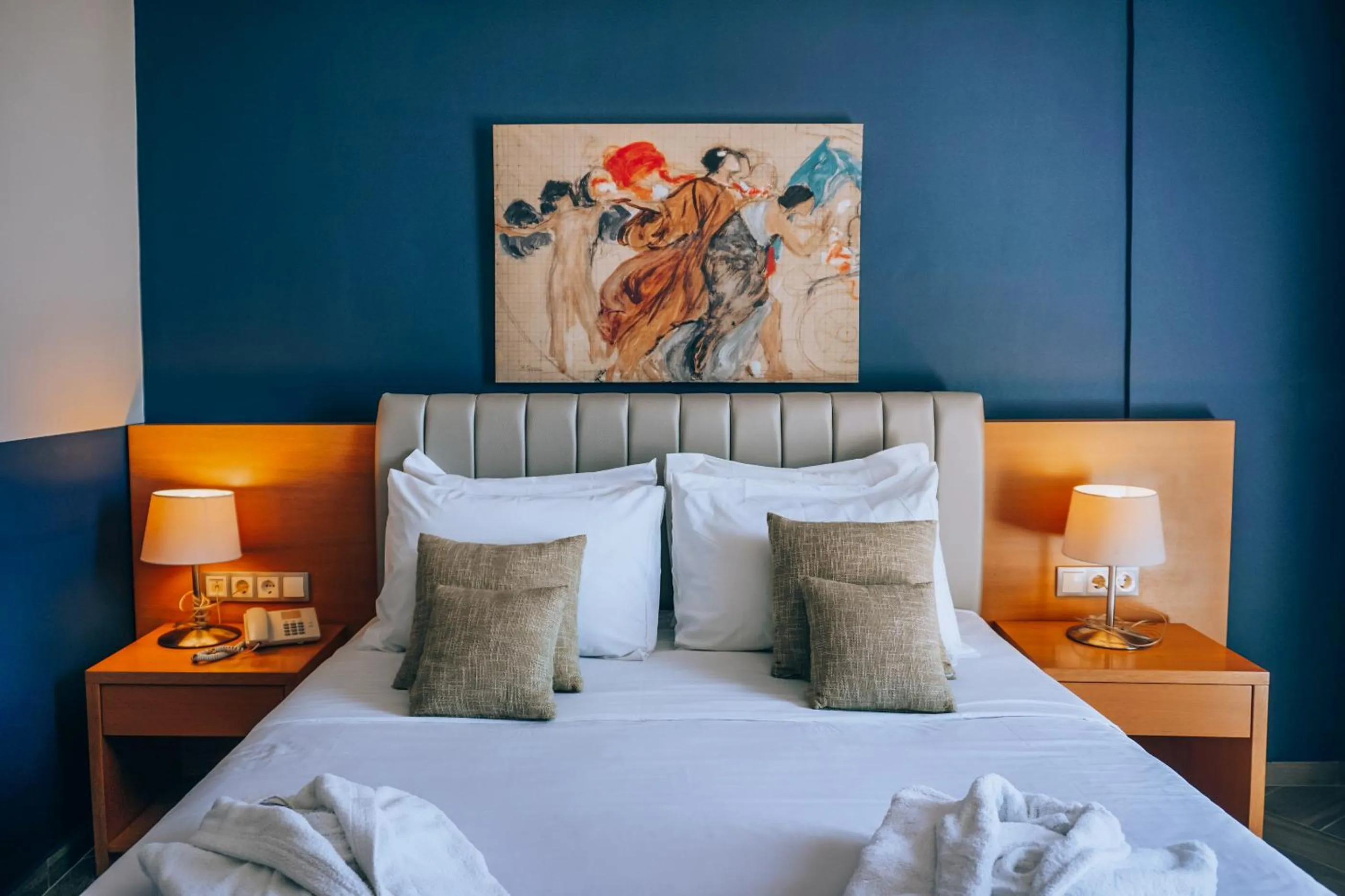 Bed in Apollo Resort Art Hotel