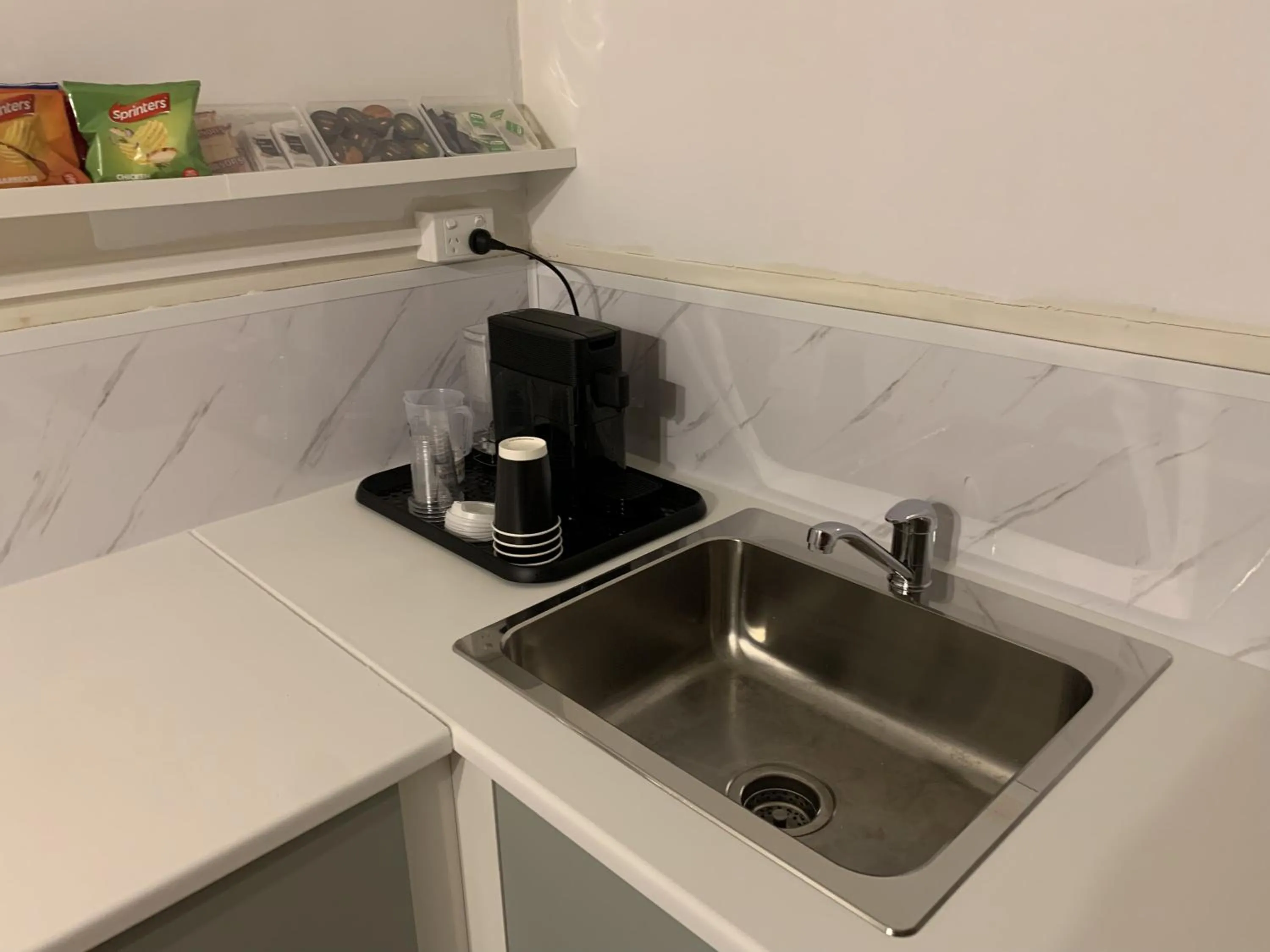 Kitchen or kitchenette in The Reserve Hotel