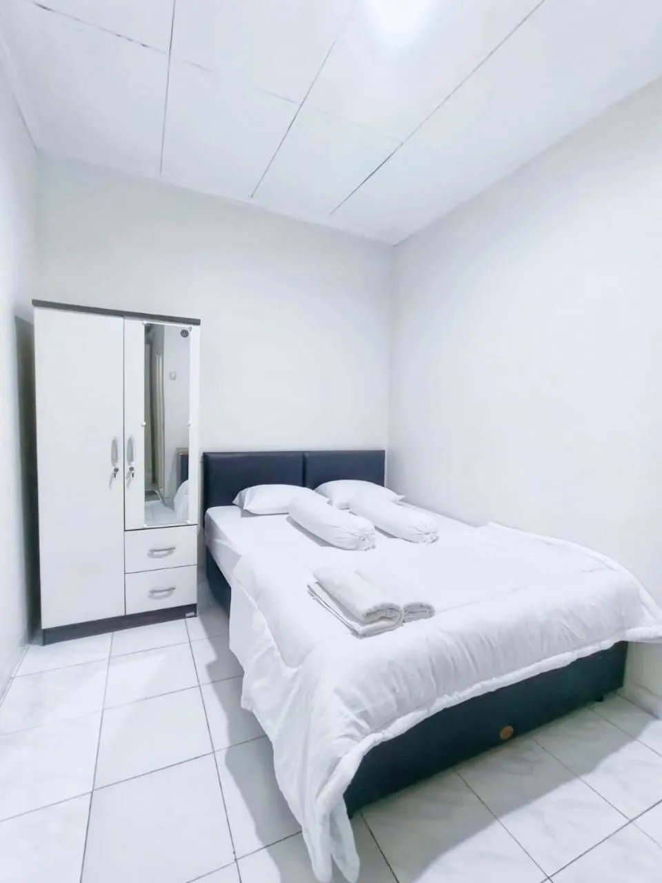 Bed in Kost Griya Asri by ecommerceloka