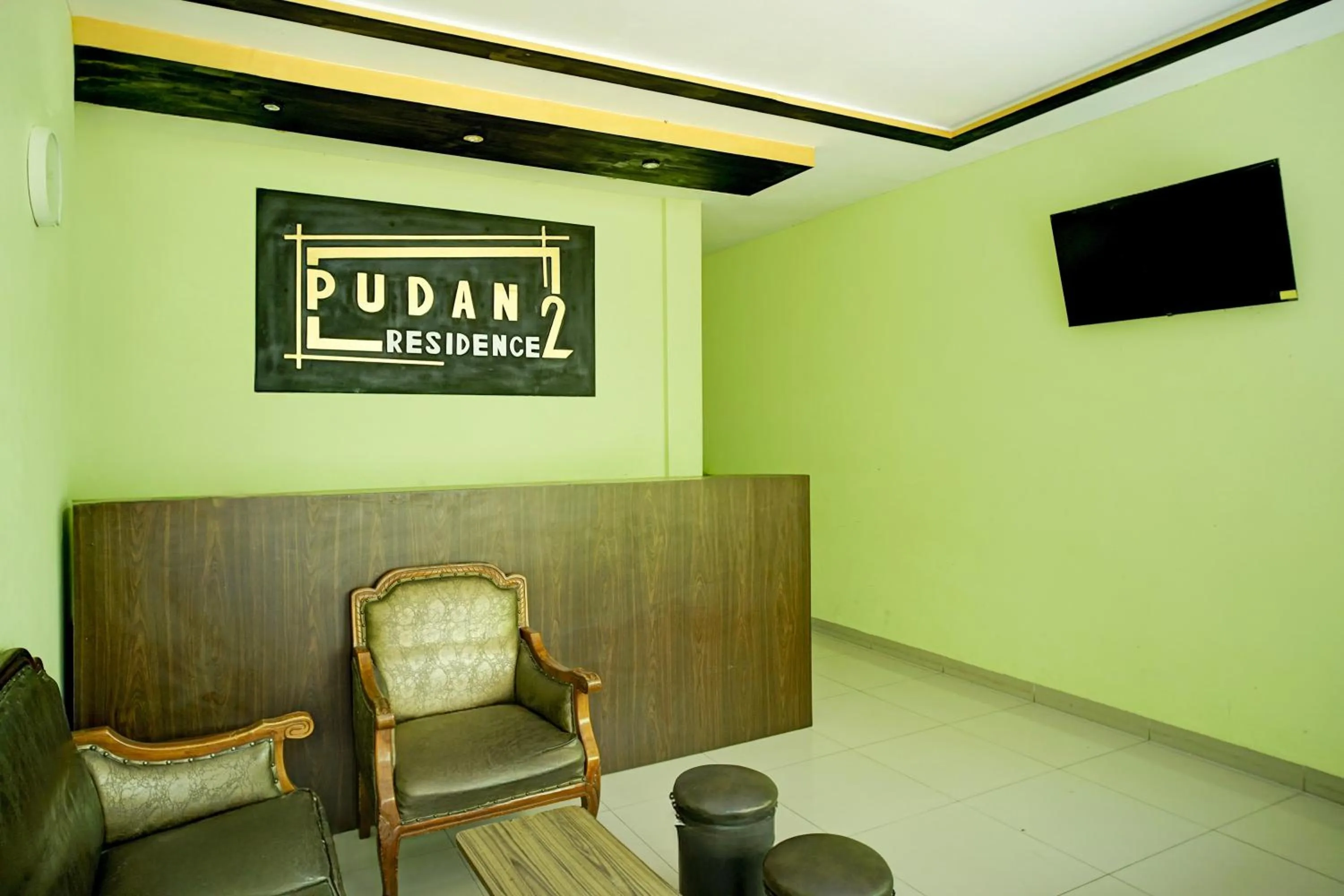 Lobby or reception in Hotel O Parapat Near Dermaga Ajibata Formerly Pudan Residence 2