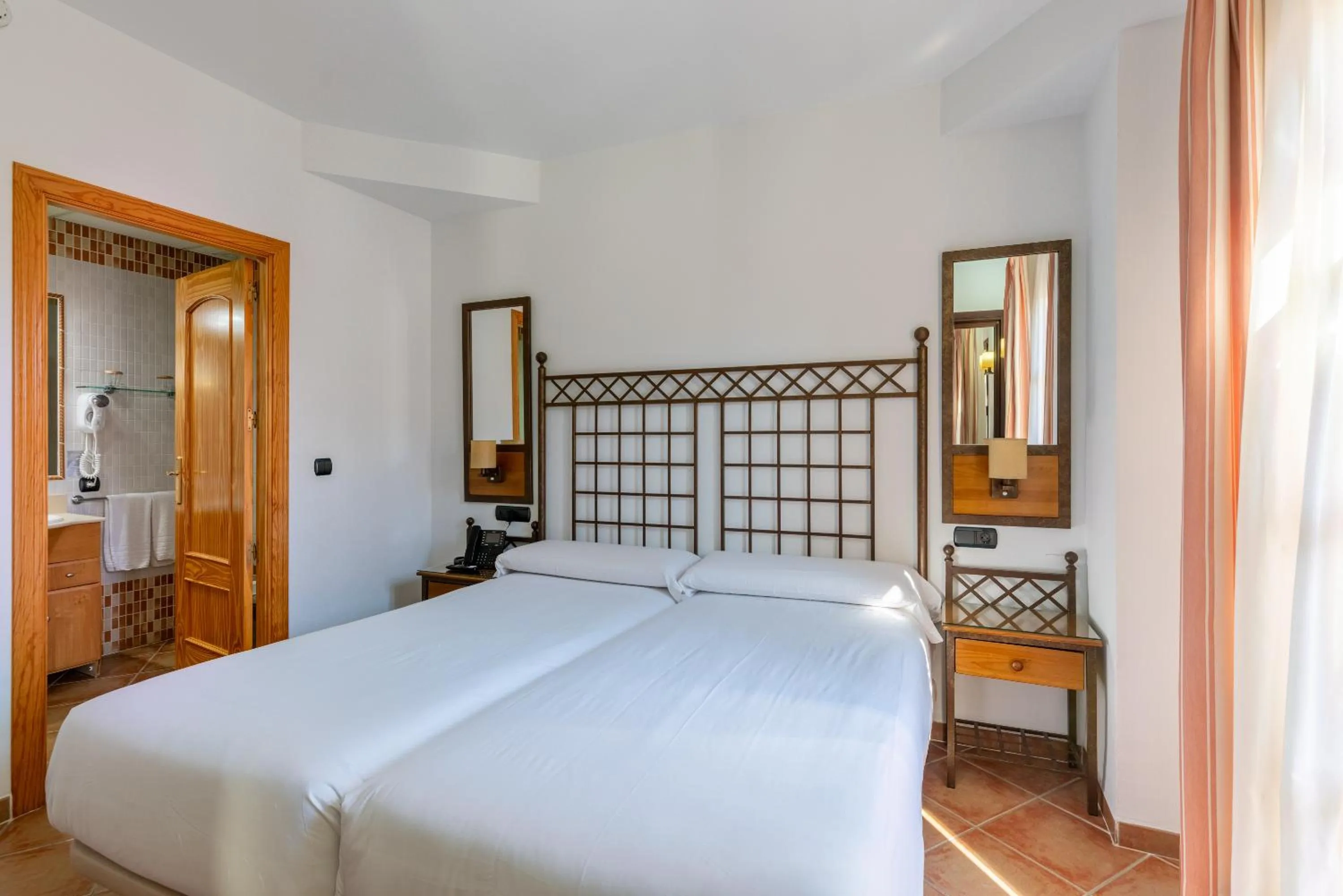 Bed in HOTEL HACIENDA SANTA BARBARA