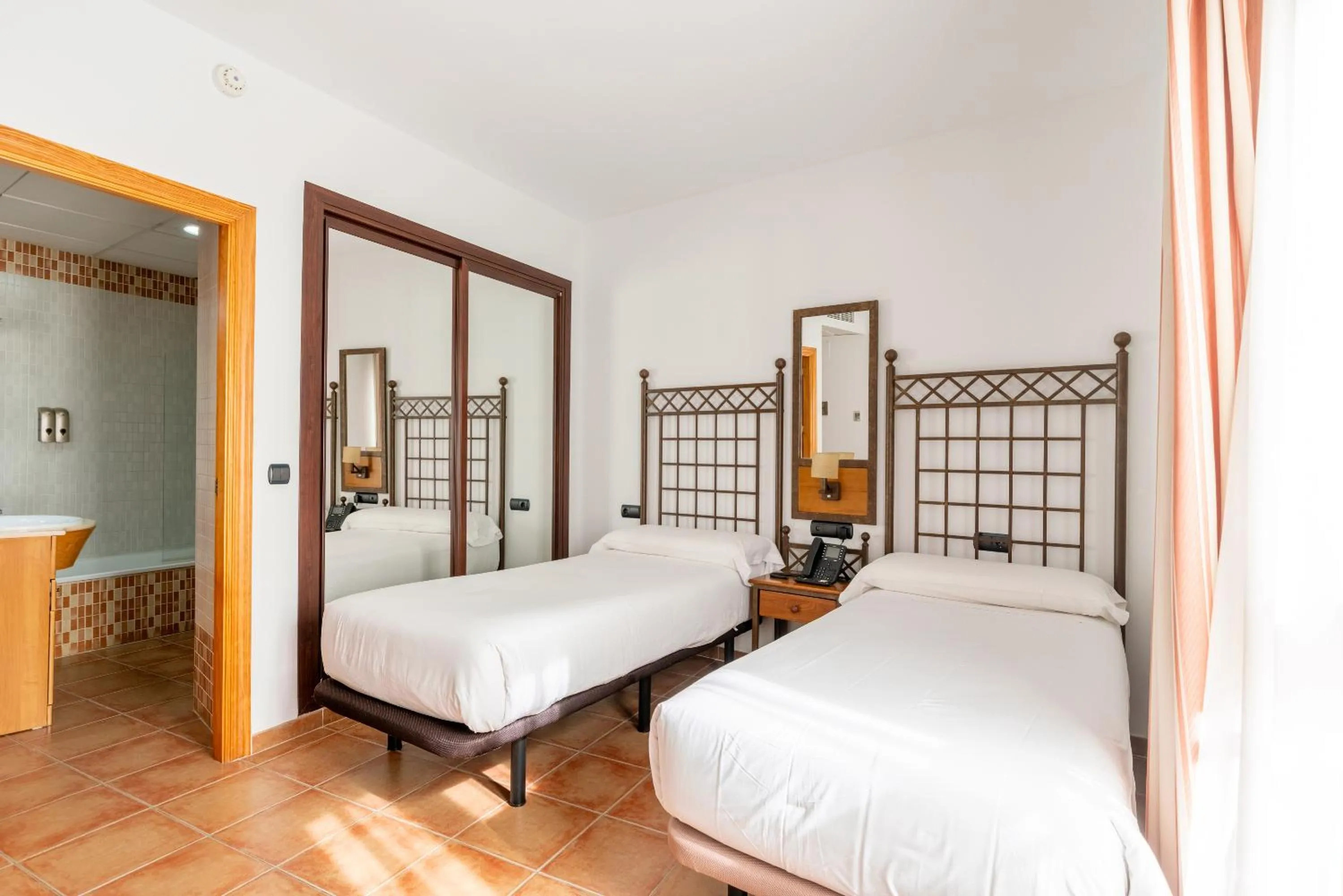 Bed in HOTEL HACIENDA SANTA BARBARA