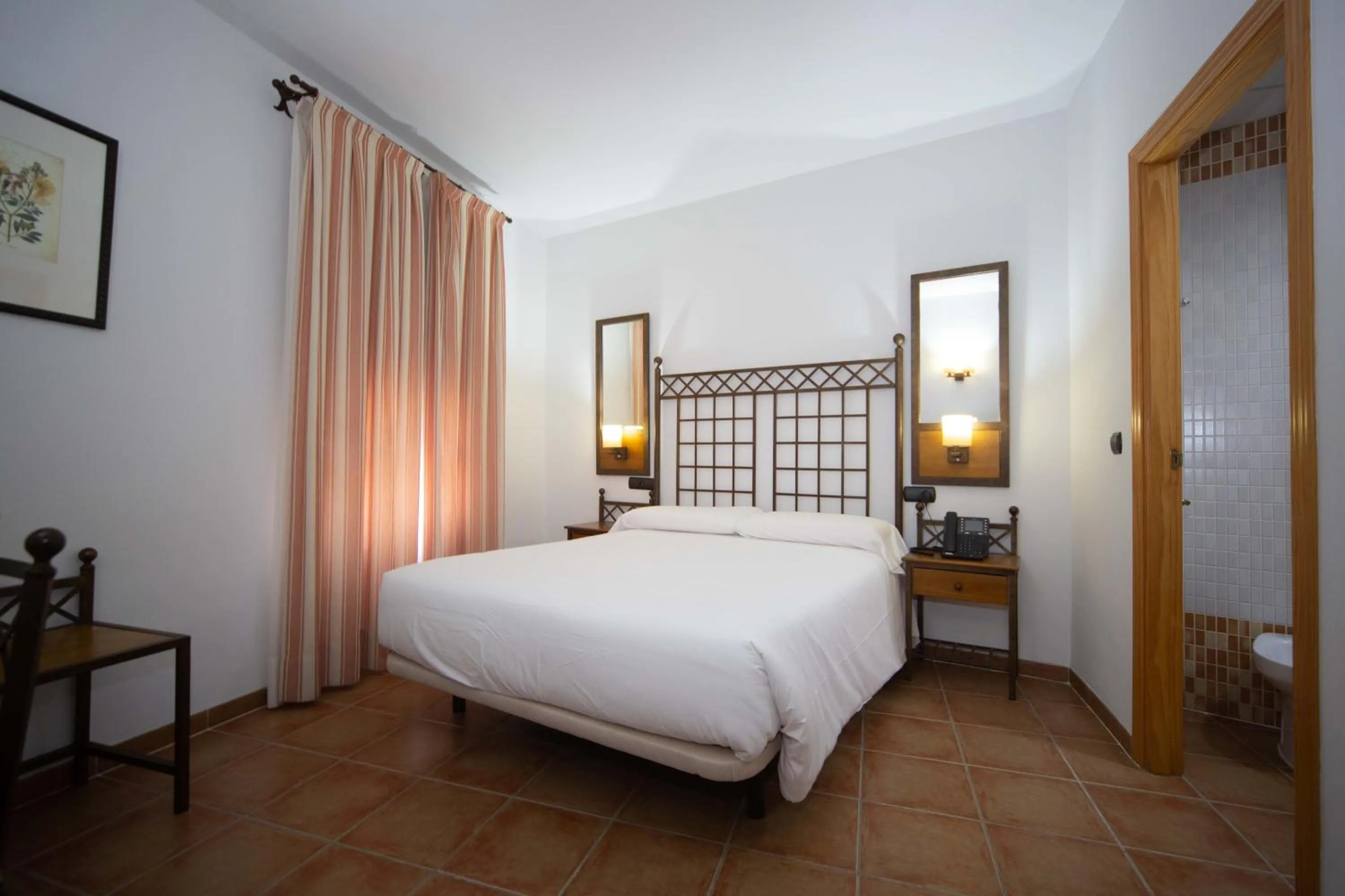 Bed in HOTEL HACIENDA SANTA BARBARA