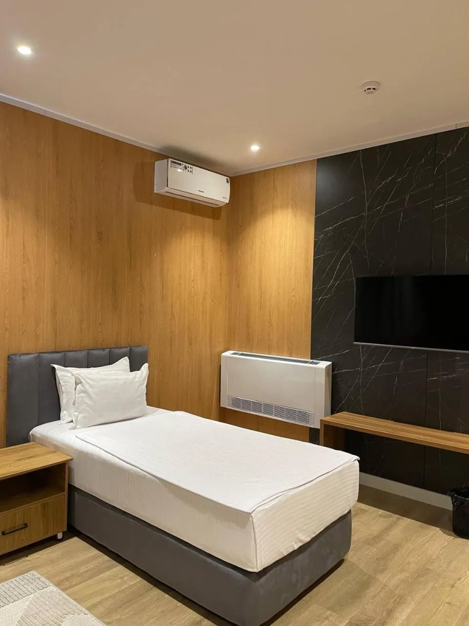 Bed in WELLFORT HOTEL