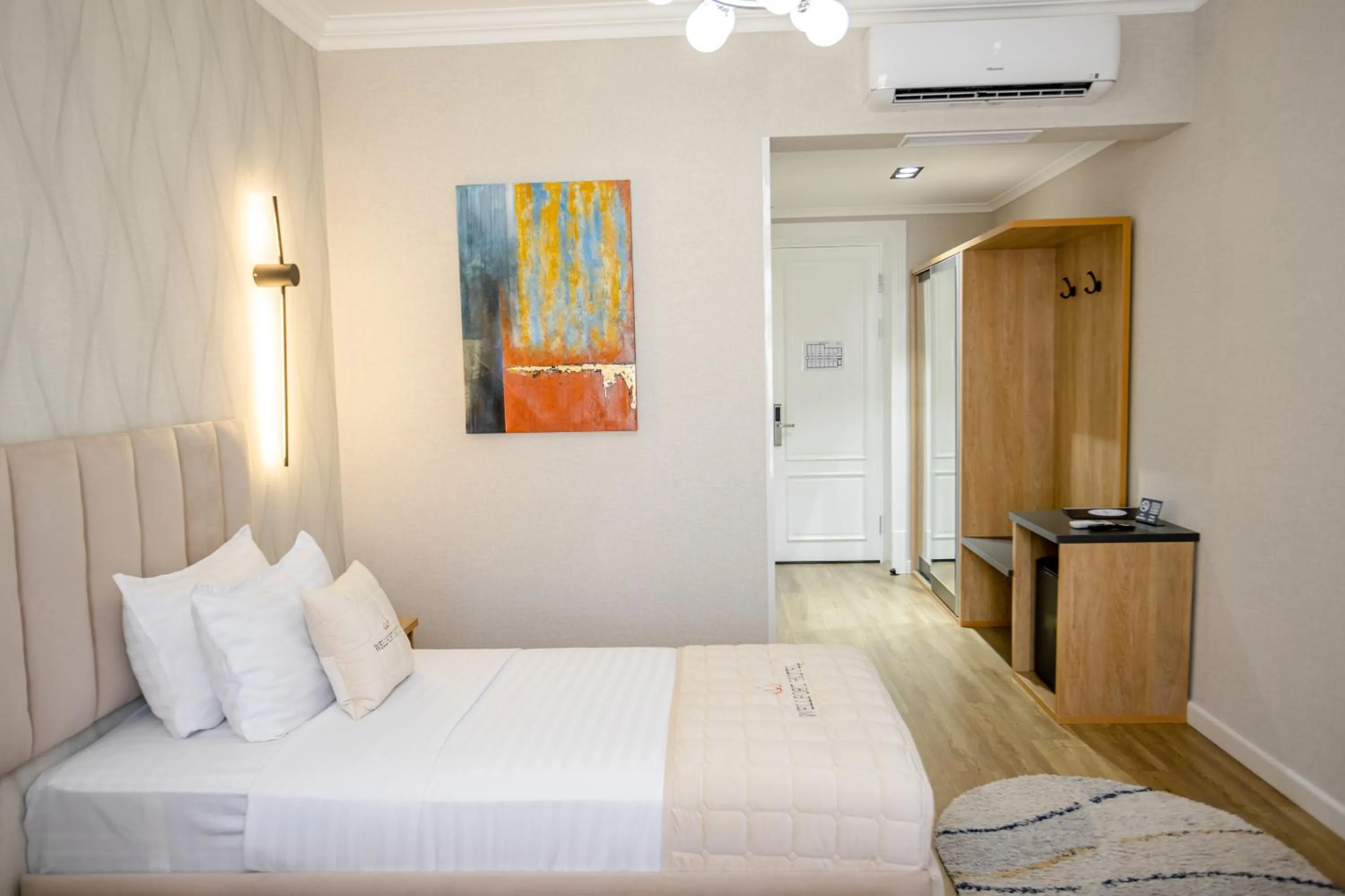 Bed in WELLFORT HOTEL