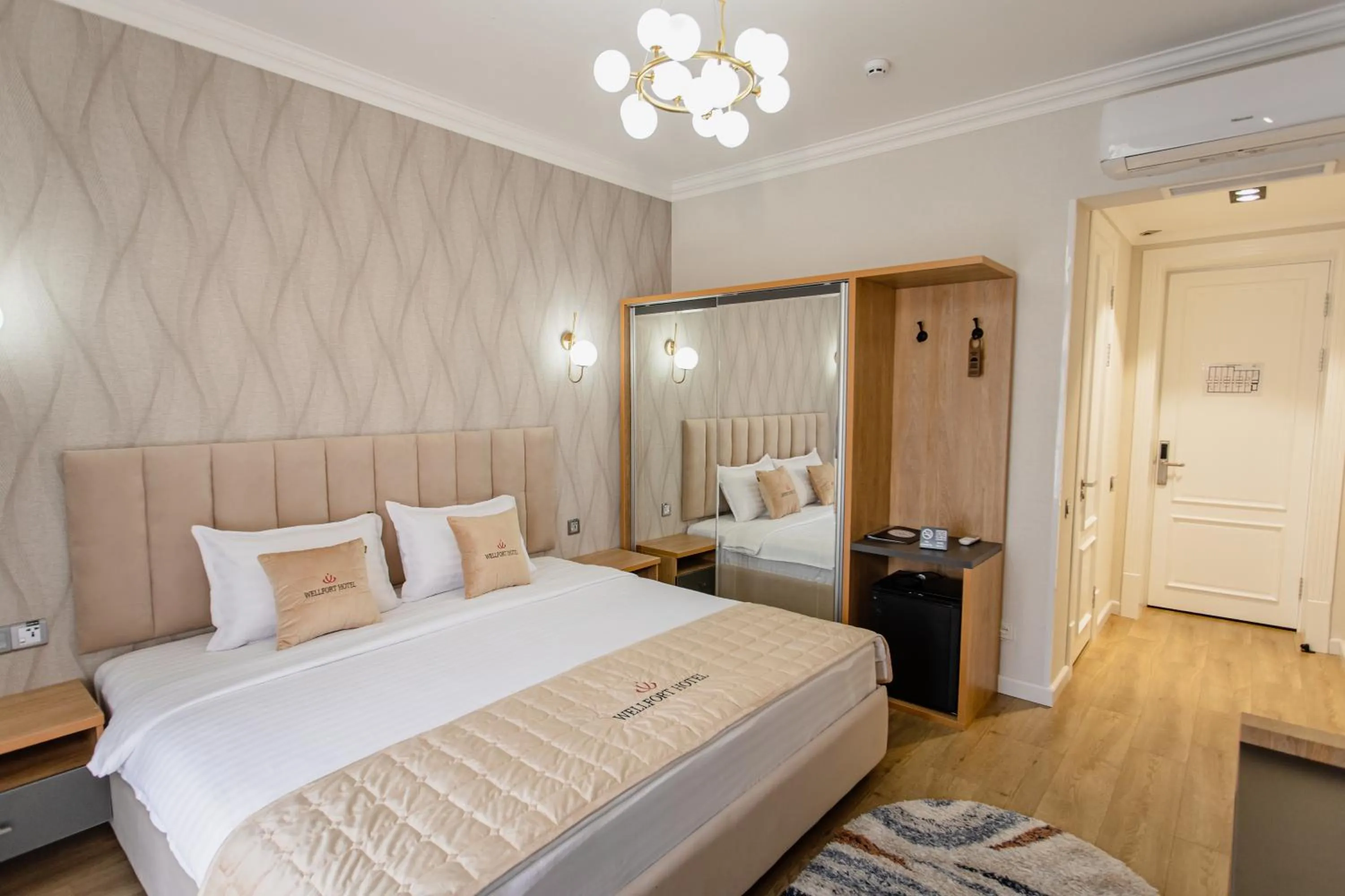 Bed in WELLFORT HOTEL