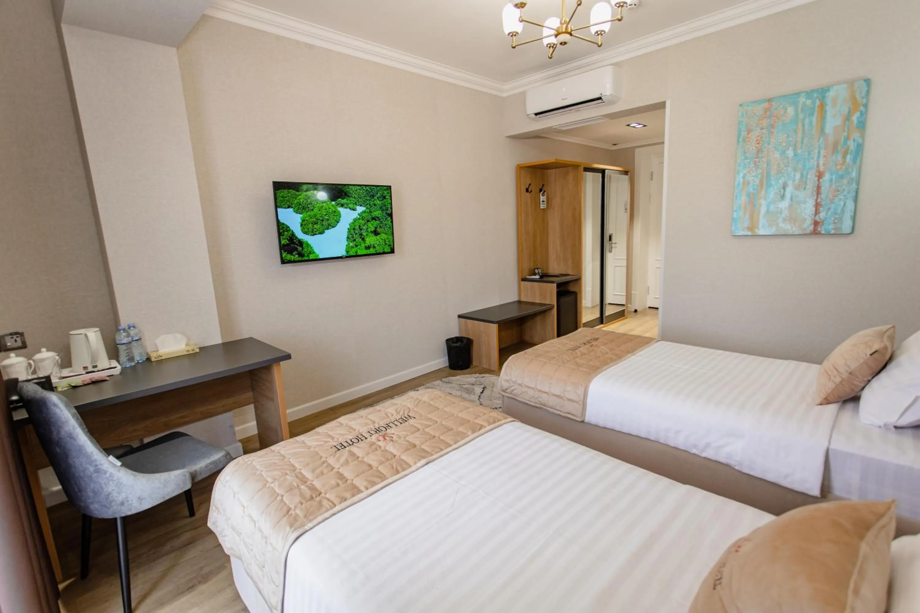 Bed in WELLFORT HOTEL