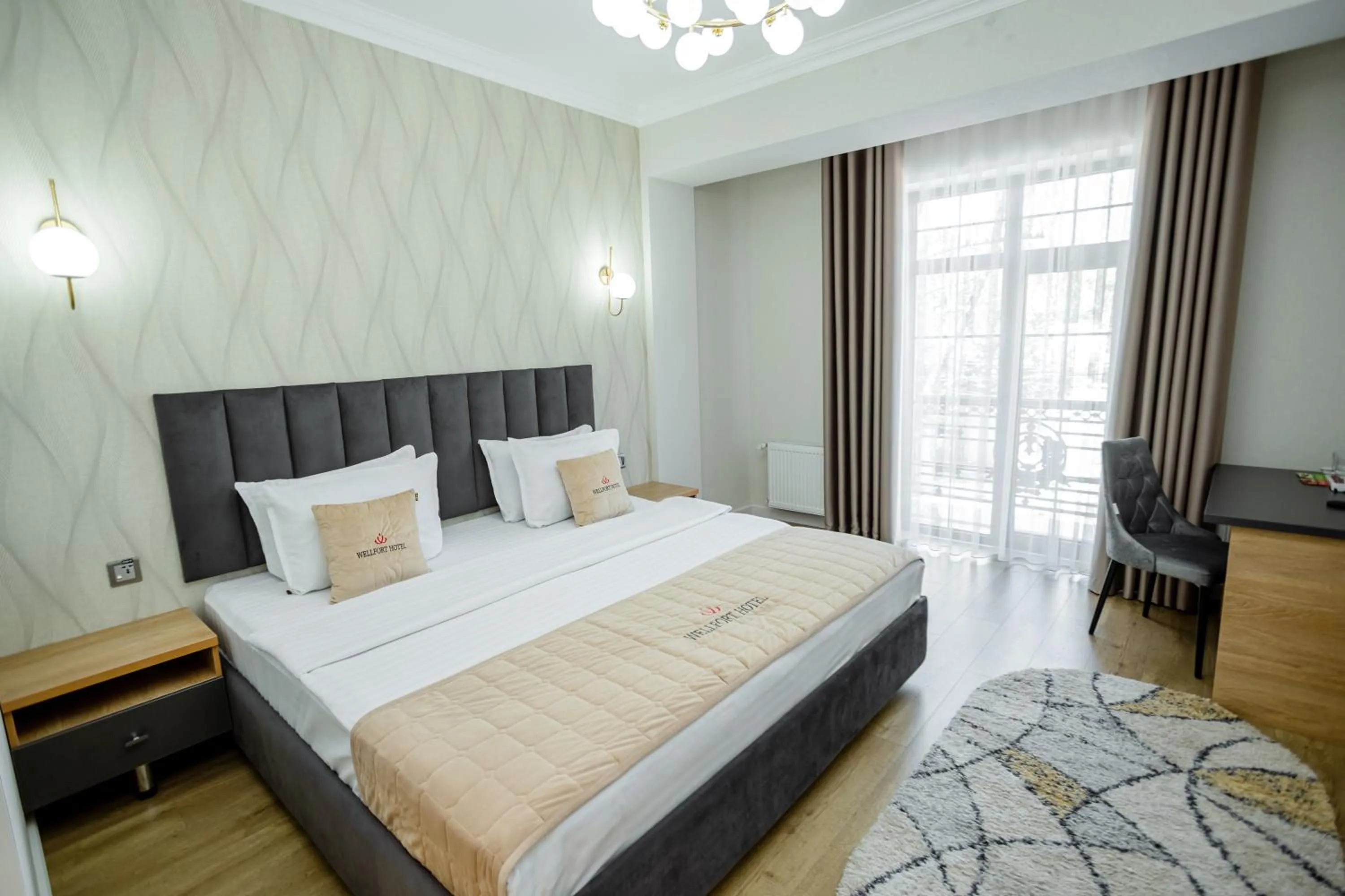 Bed in WELLFORT HOTEL