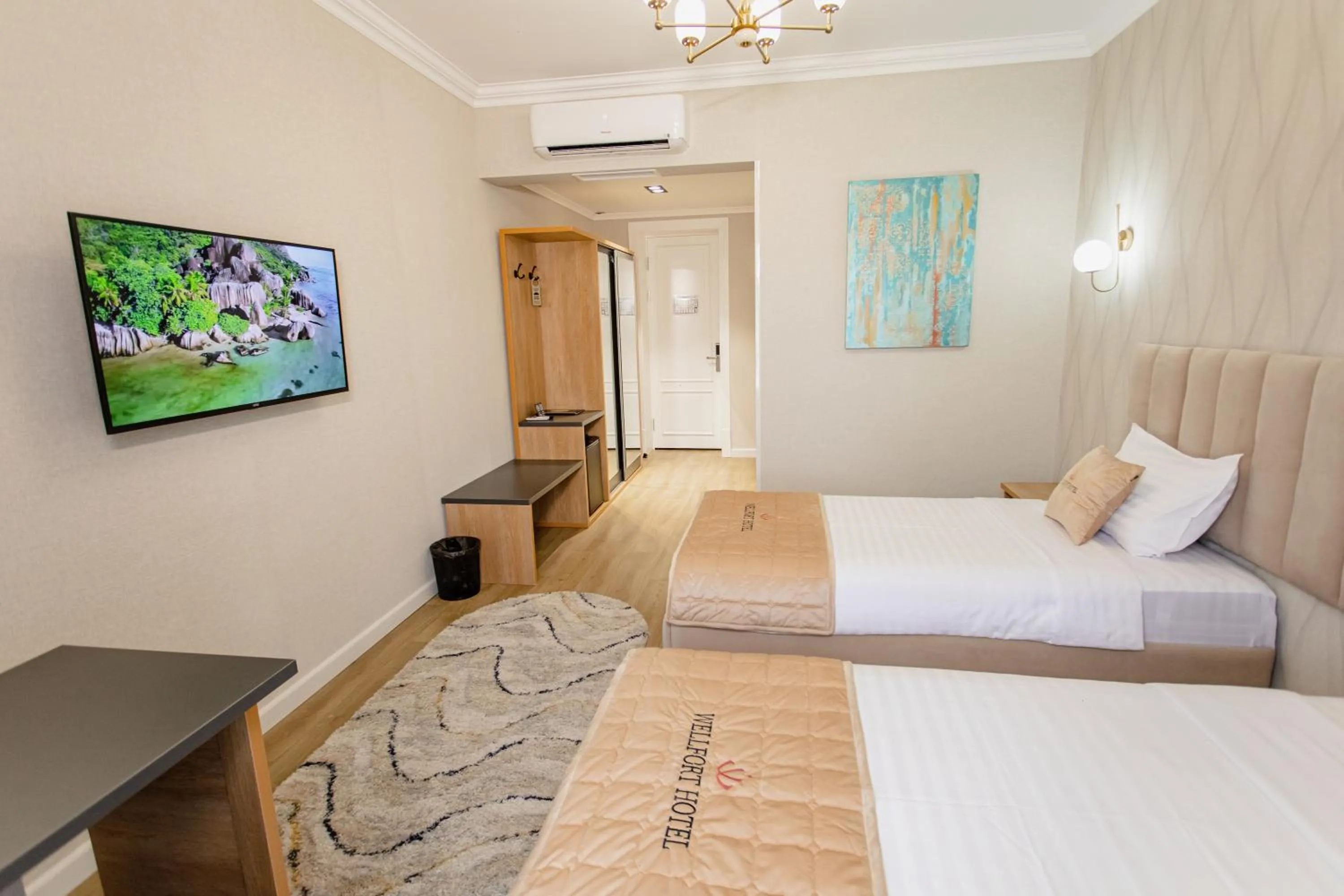 Bed in WELLFORT HOTEL