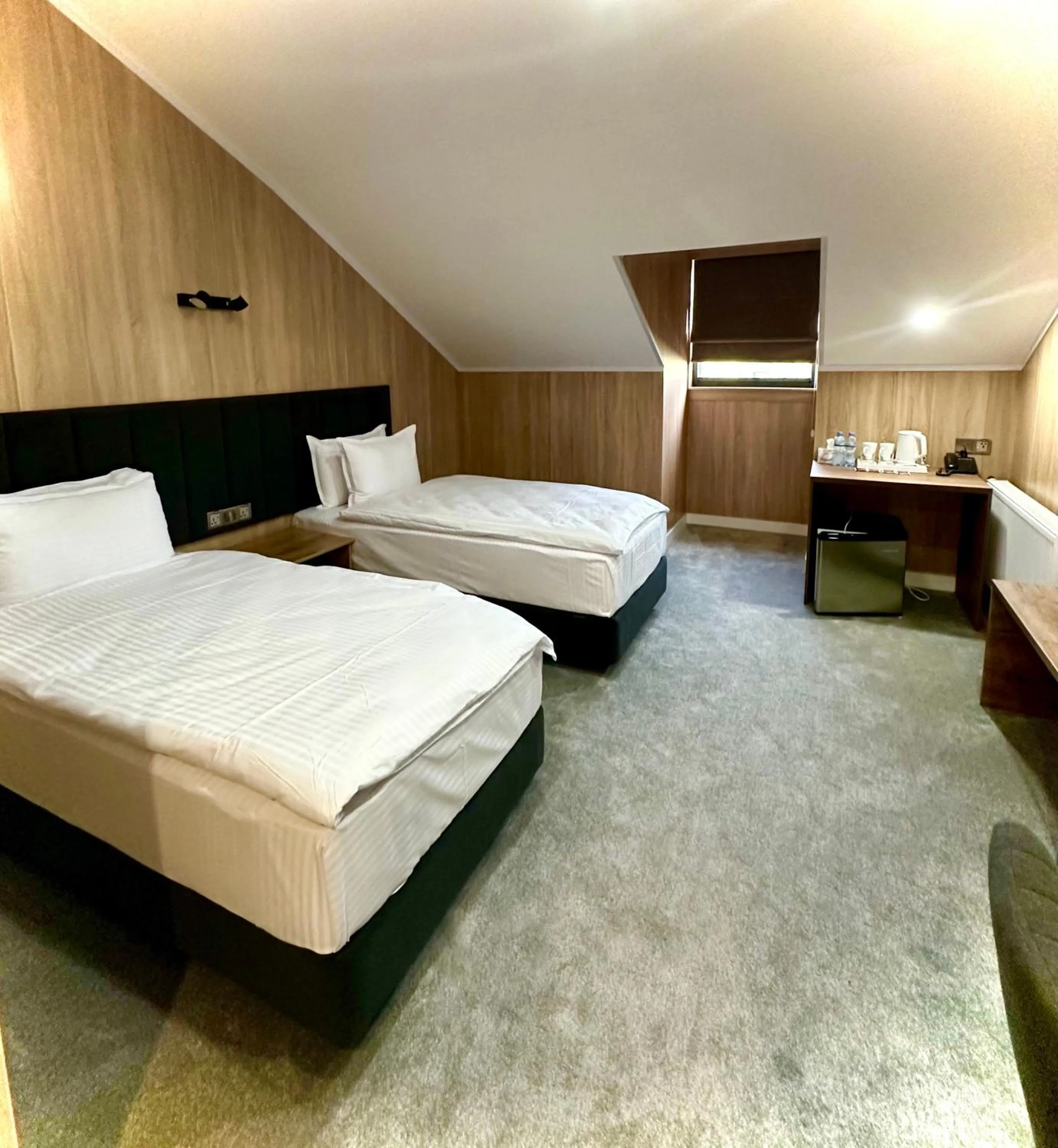 Bed in WELLFORT HOTEL