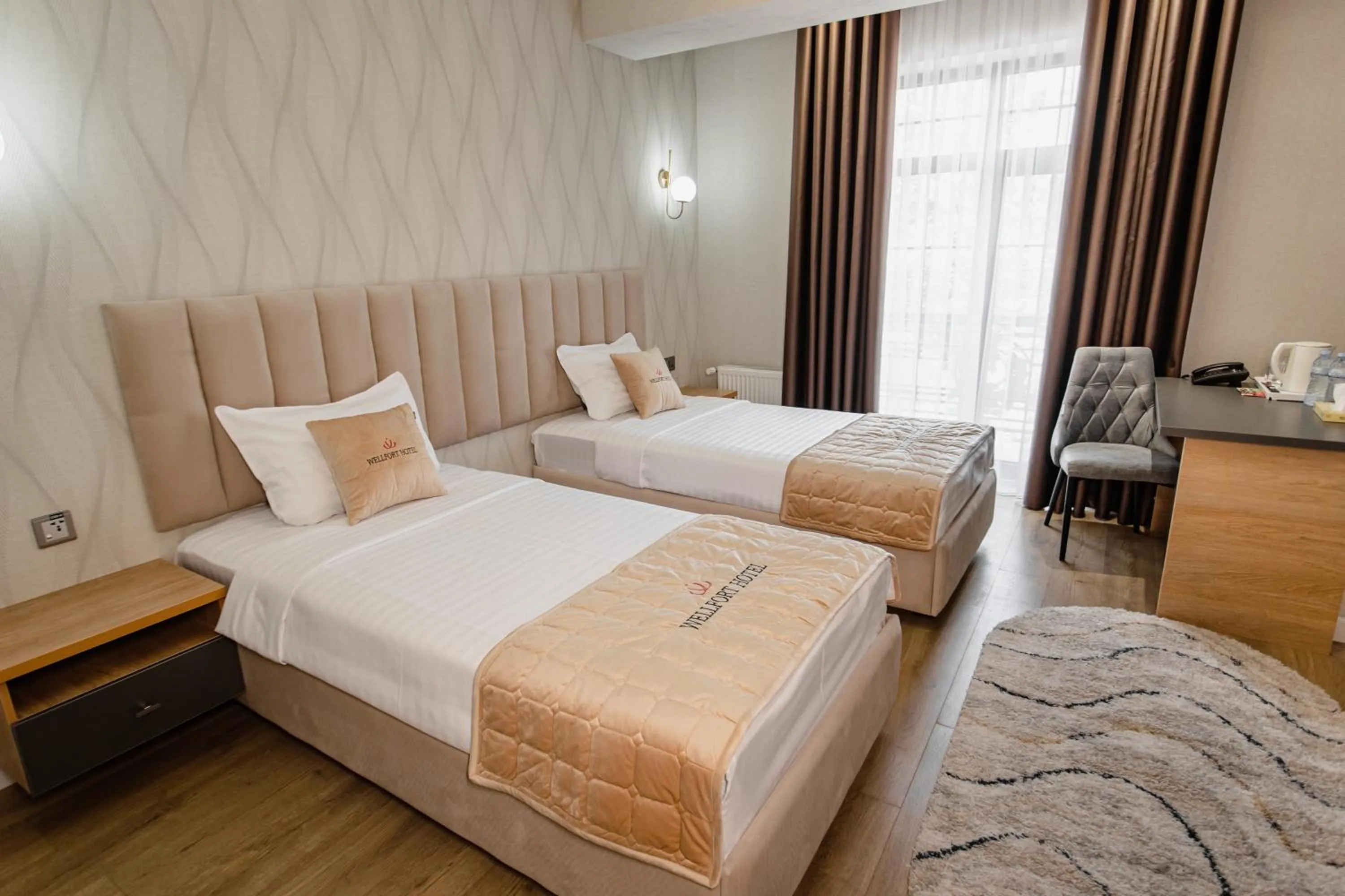 Bed in WELLFORT HOTEL