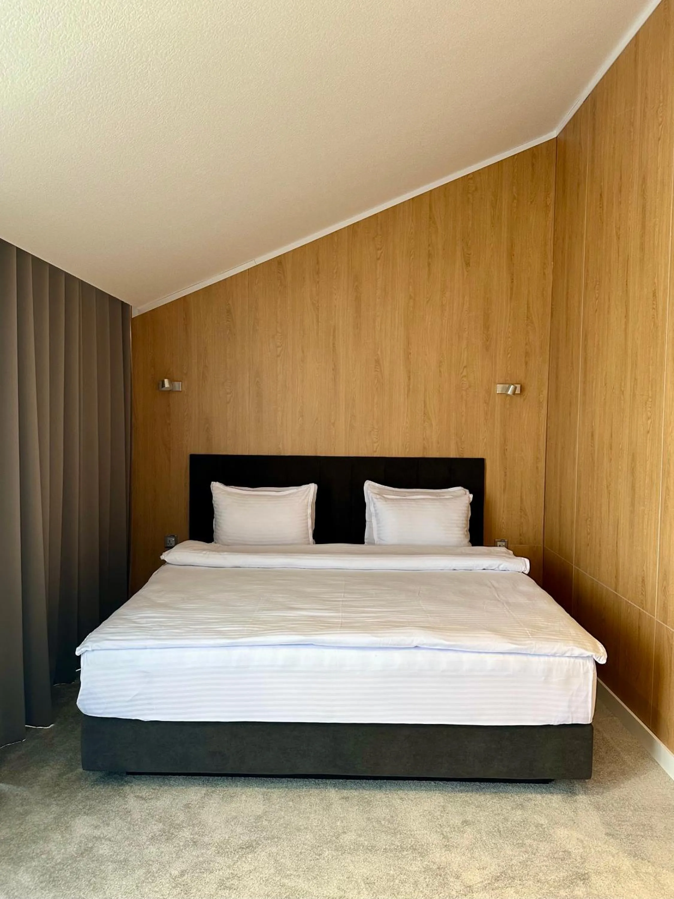 Bed in WELLFORT HOTEL