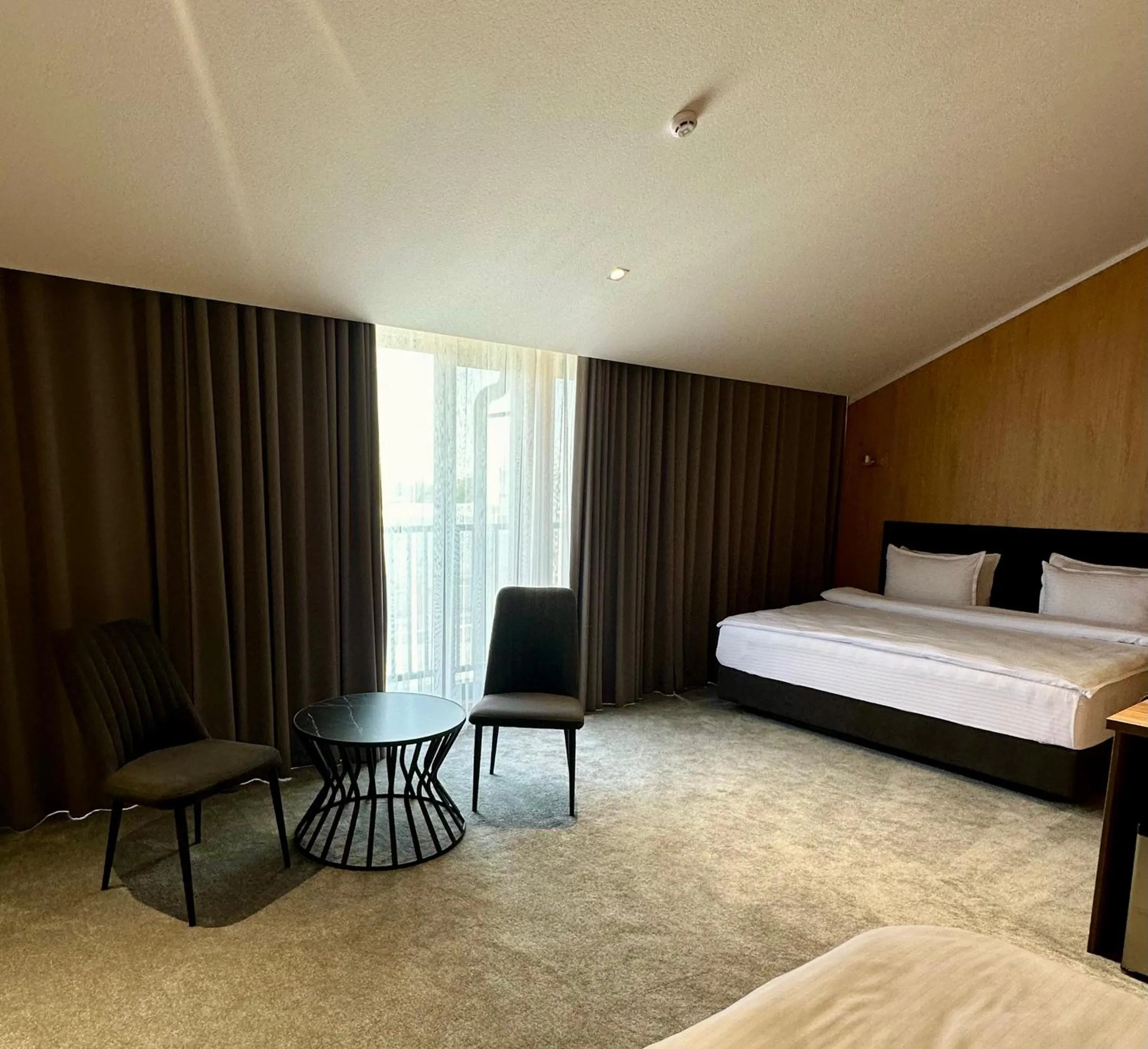 Bed in WELLFORT HOTEL