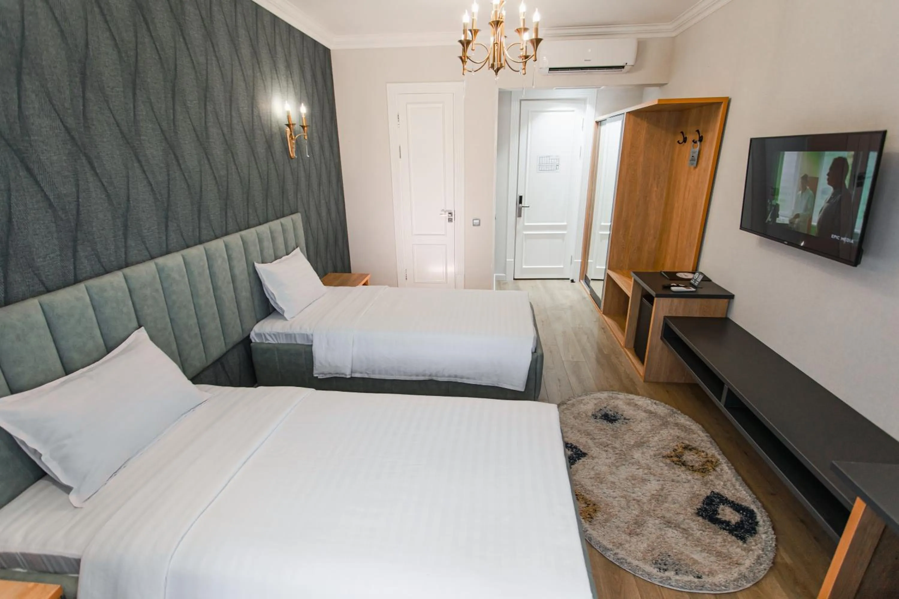 Bed in WELLFORT HOTEL