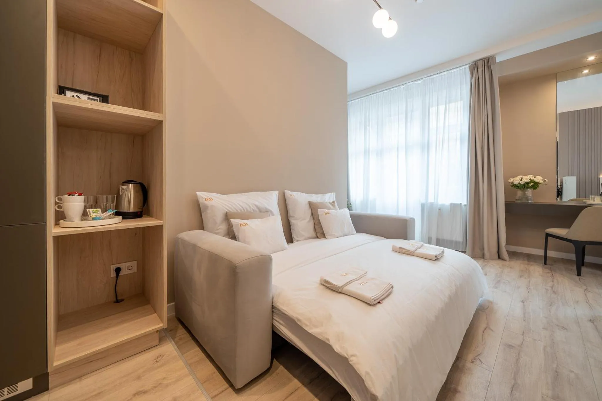 Photo of the whole room, Bed in Karoly Boutique Suites, Best Location by BQA