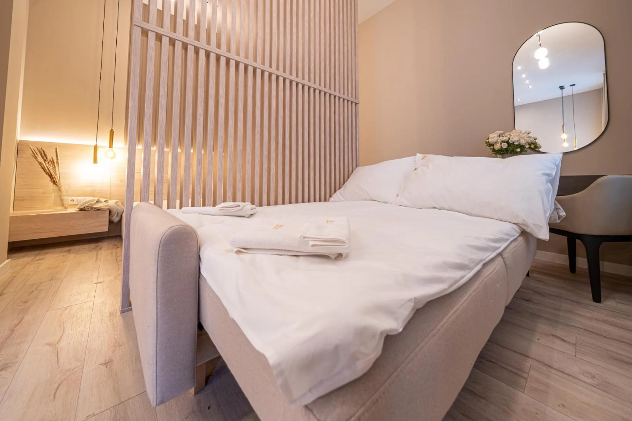 Bed in Karoly Boutique Suites, Best Location by BQA