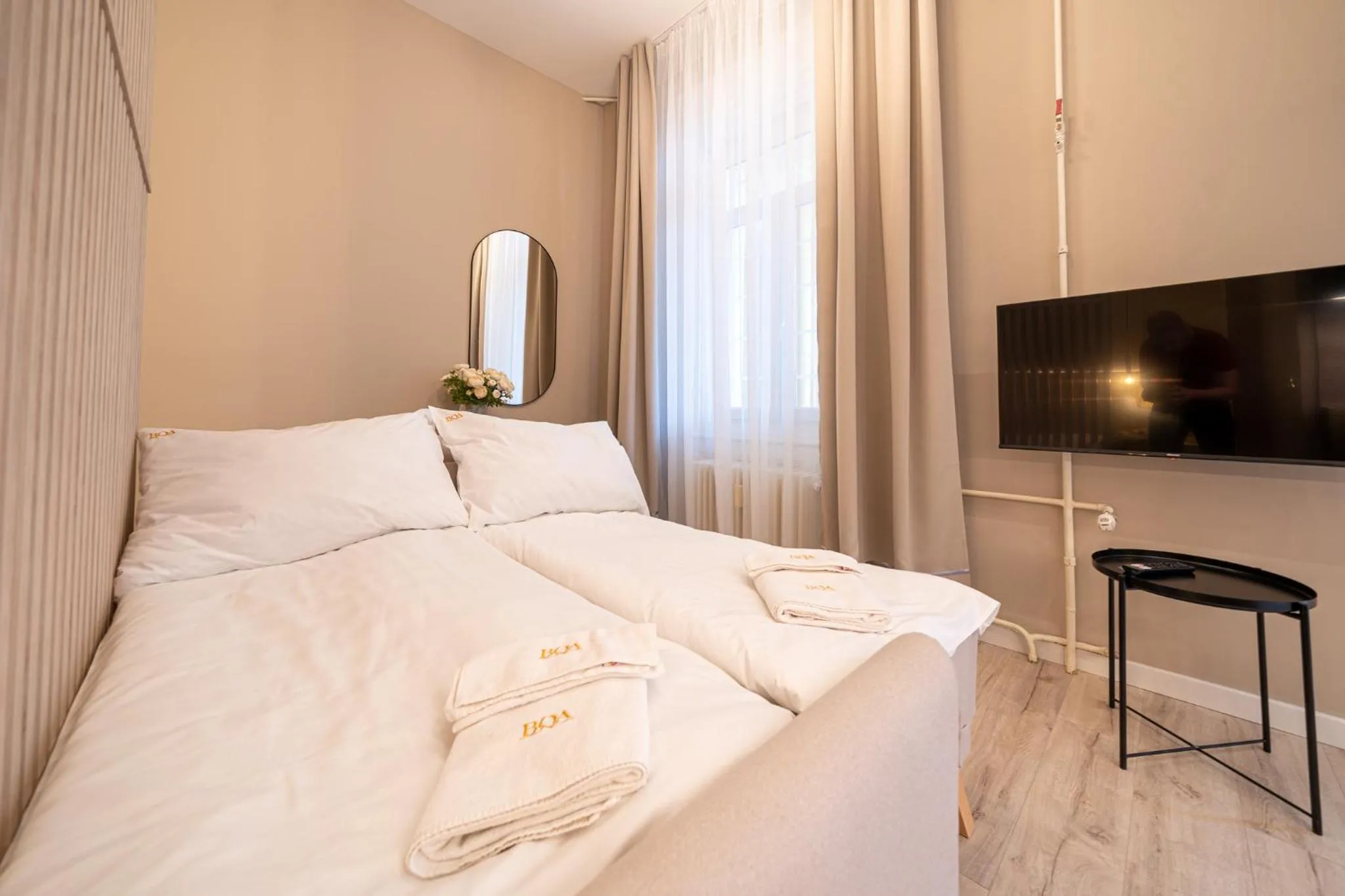 Bed in Karoly Boutique Suites, Best Location by BQA