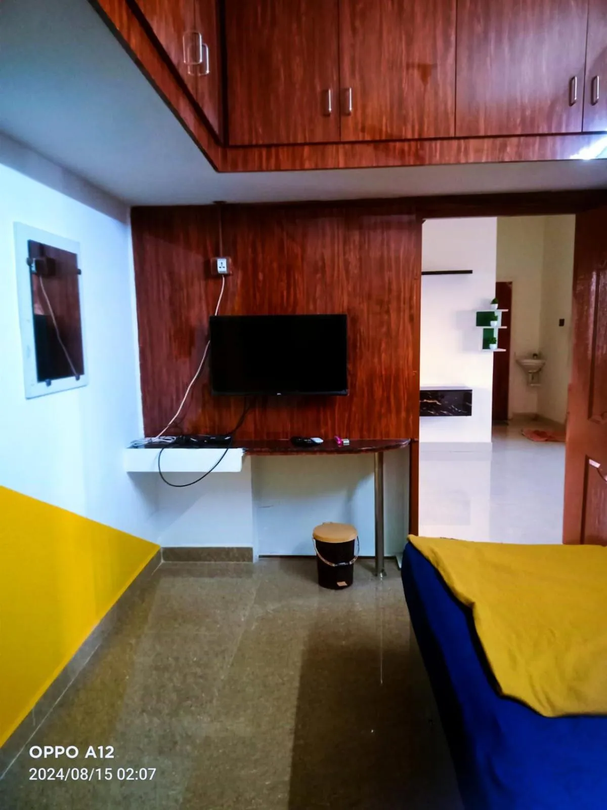 Bed in ASSHAPPYSTAYINN HOTEL