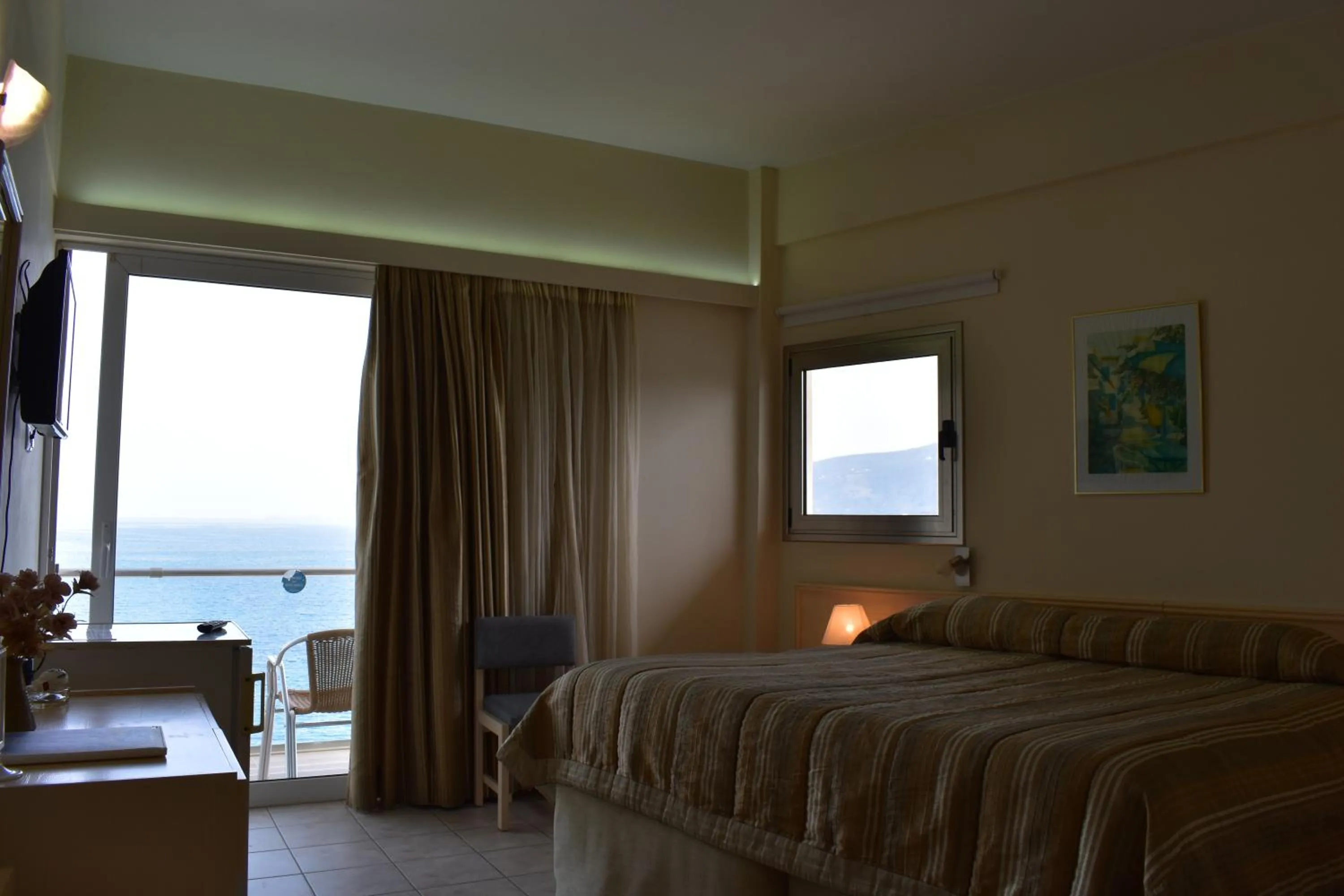 Bed in New Aegli Resort Hotel