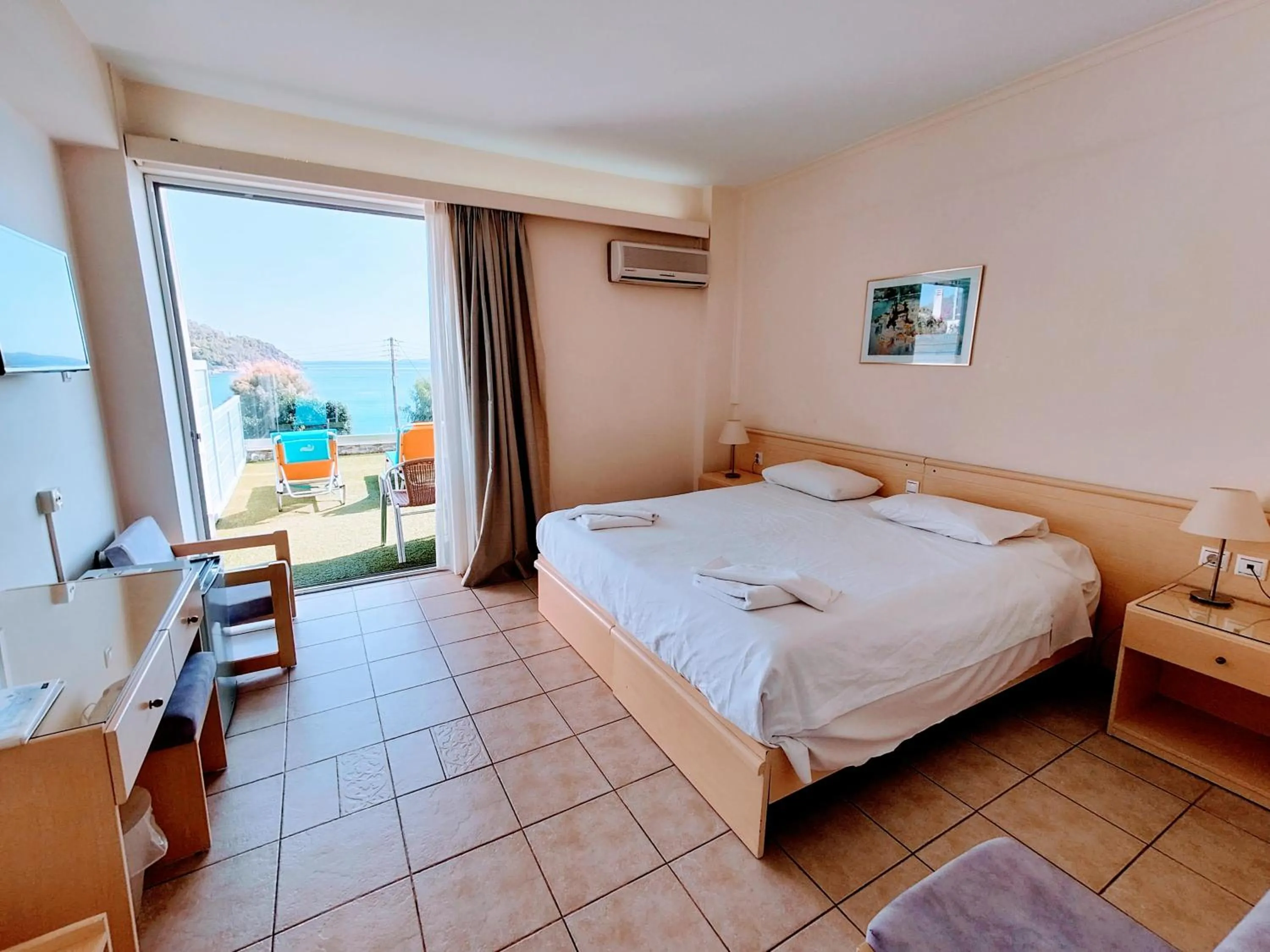 Bed in New Aegli Resort Hotel