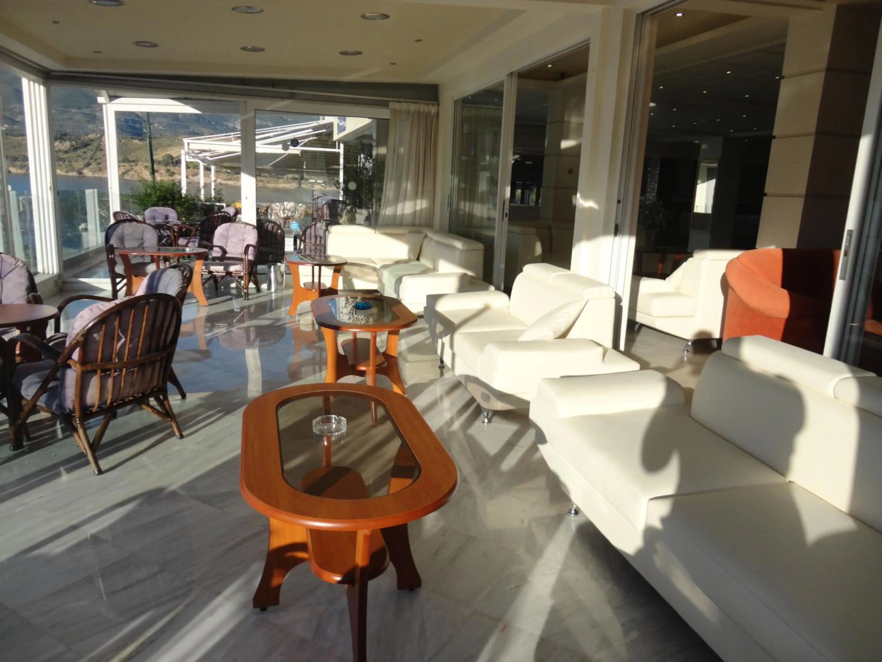Lounge or bar in New Aegli Resort Hotel