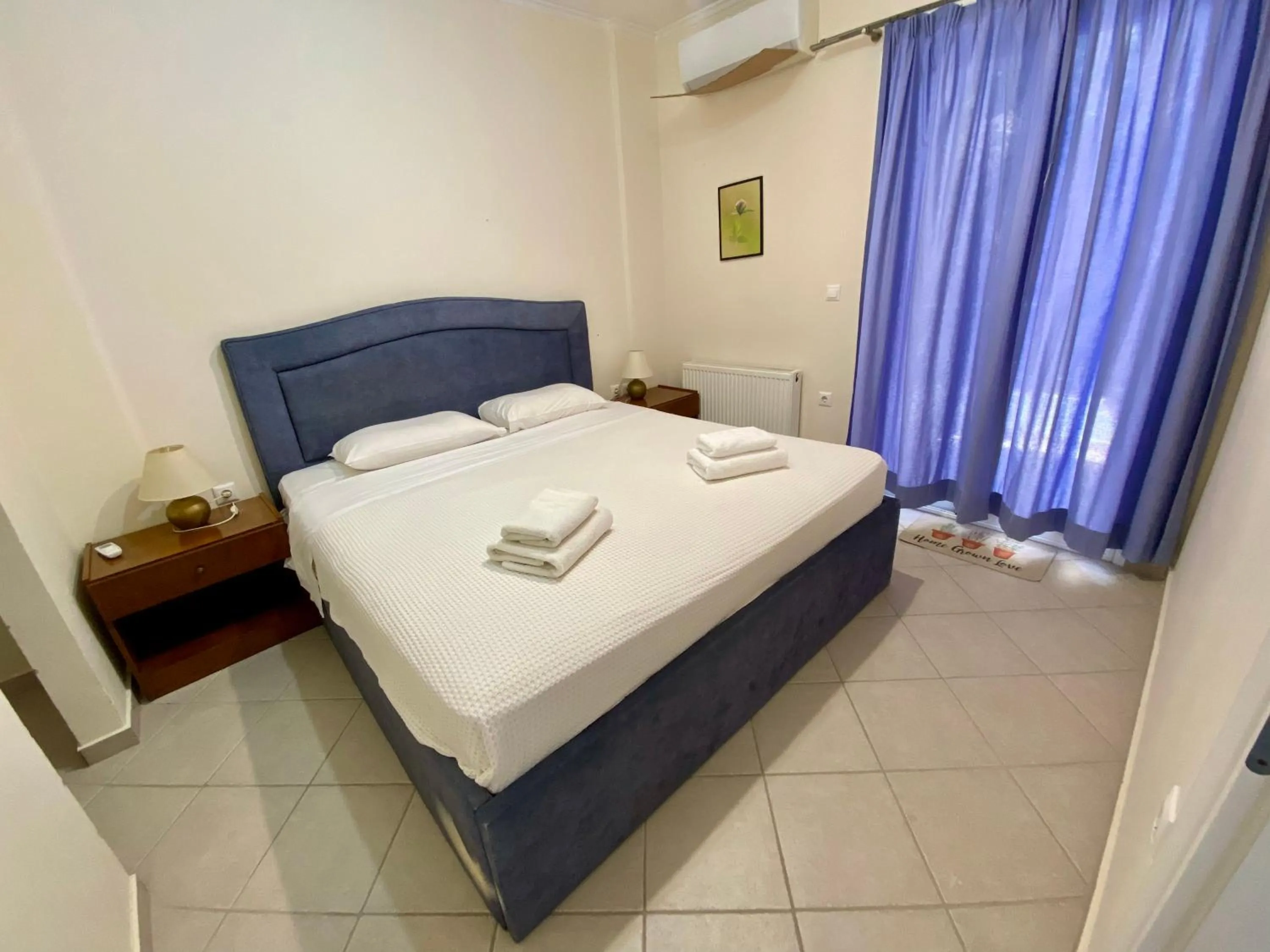 Bed in New Aegli Resort Hotel