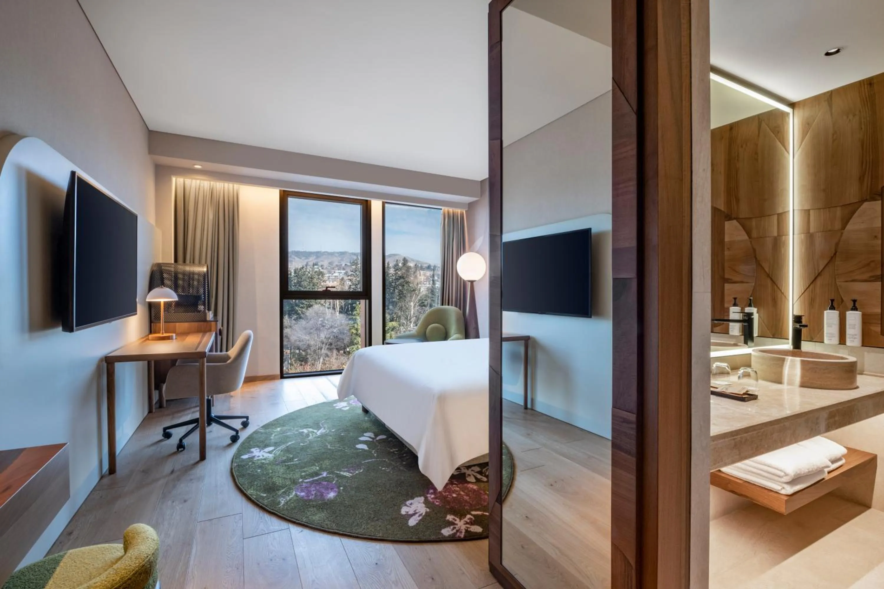 Bed in Swissôtel Tbilisi