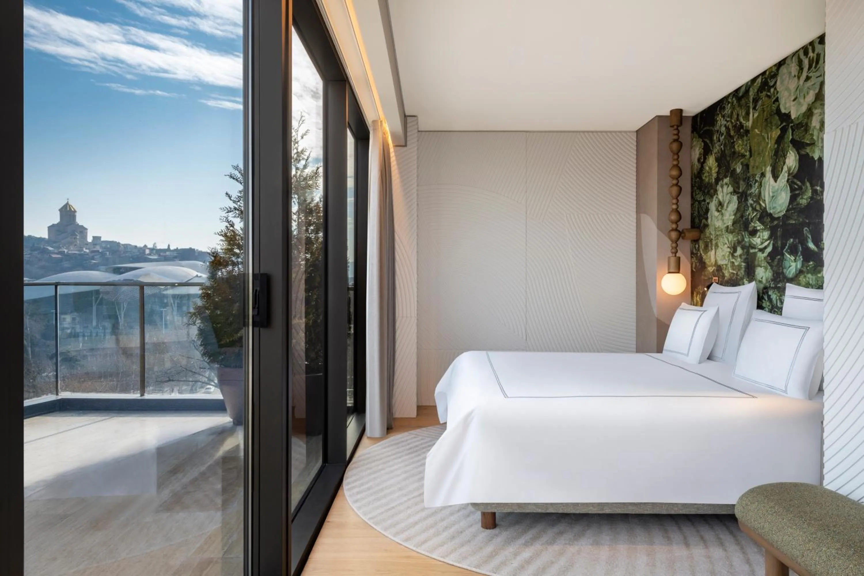 Bed in Swissôtel Tbilisi