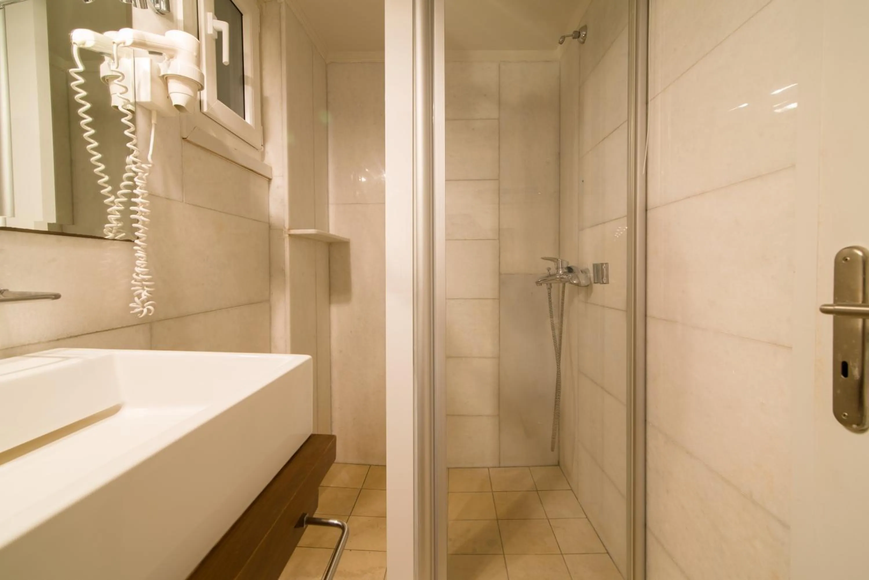 Shower in Antinea Suites Hotel & Spa