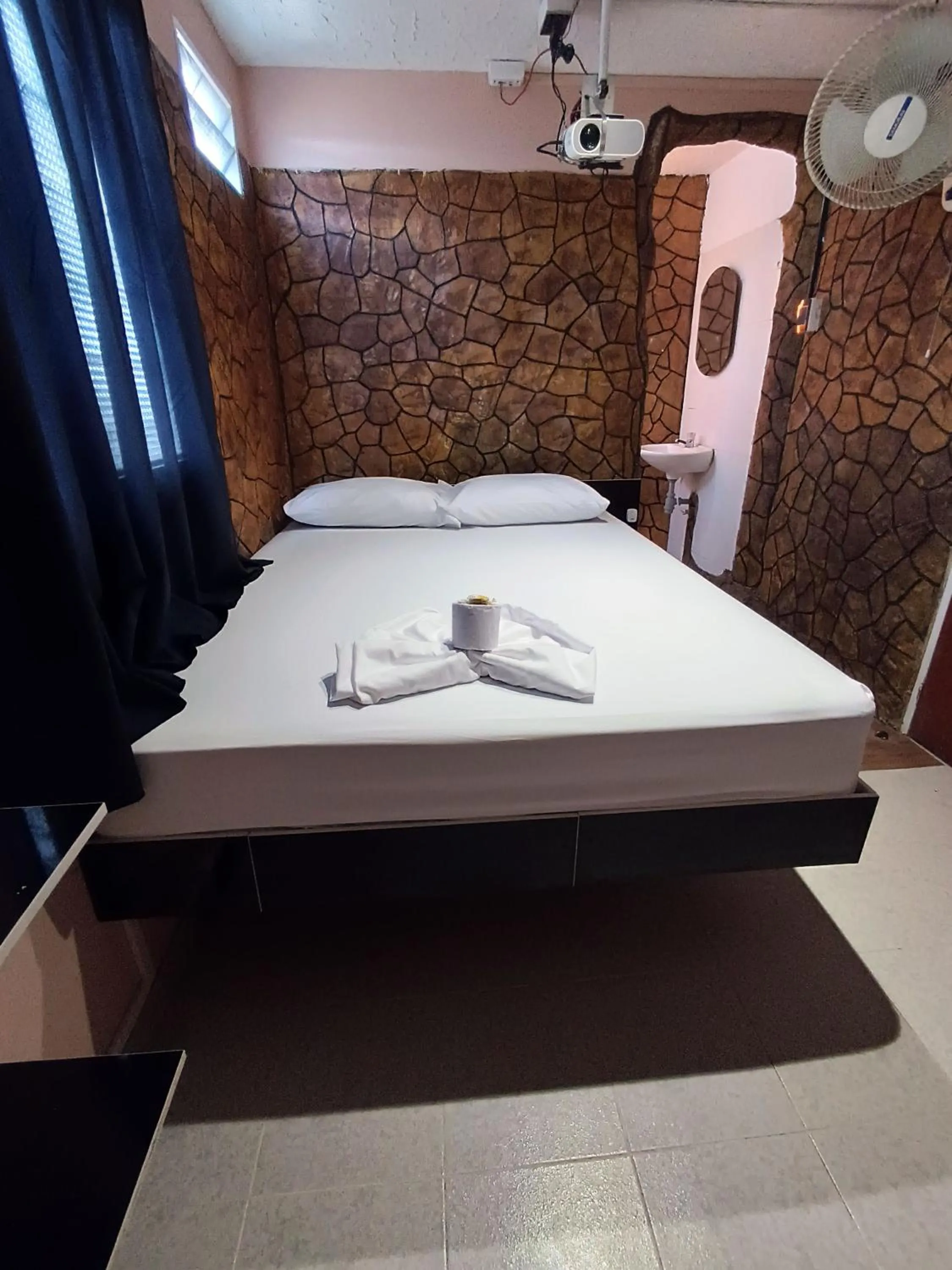 Bed in Hotel Grand ilama