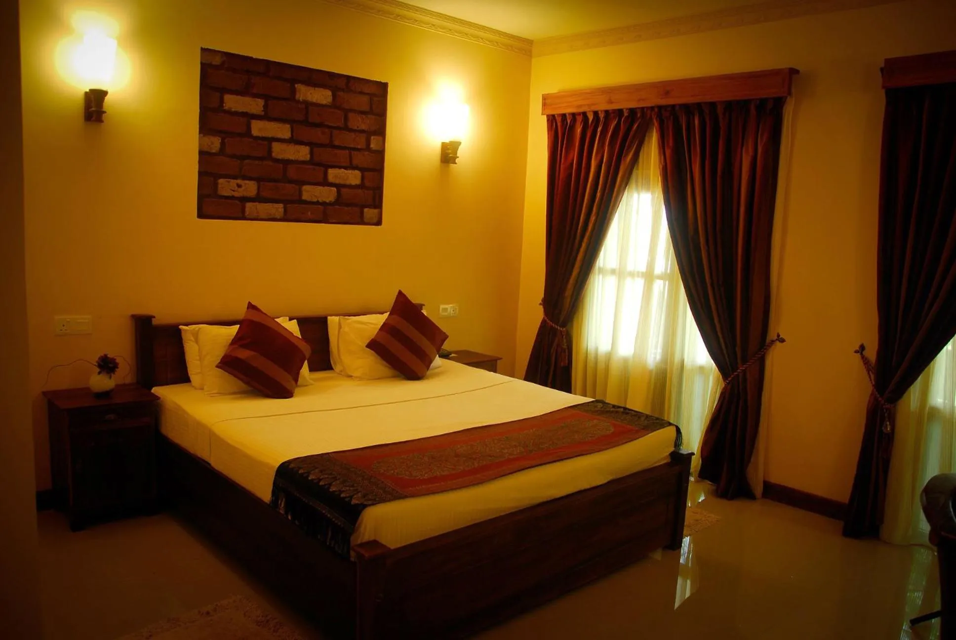 Bed in Vintara Eco Resort