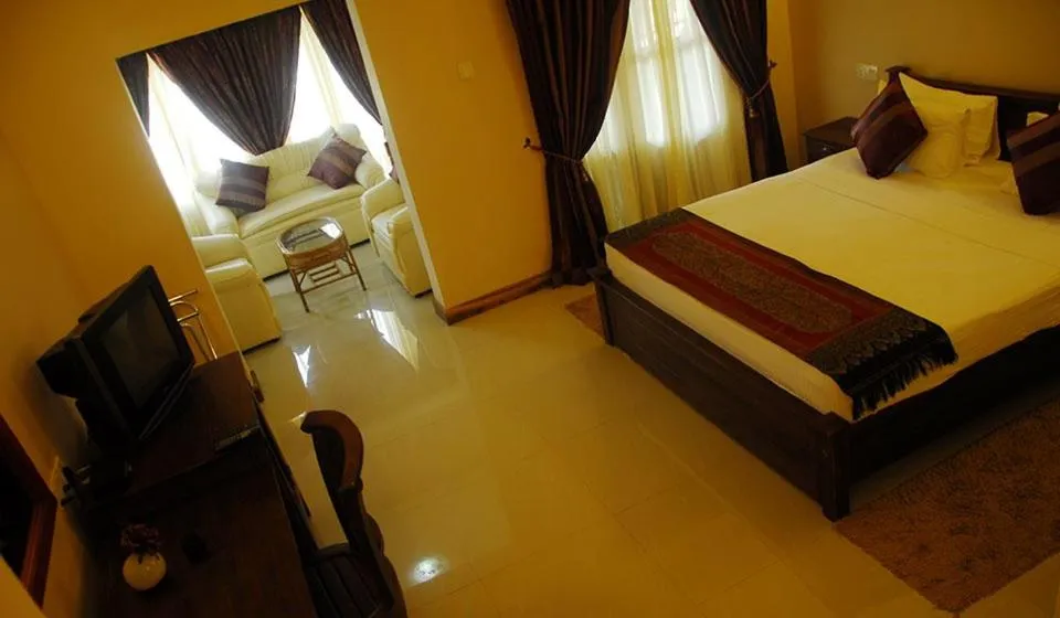 Bed in Vintara Eco Resort