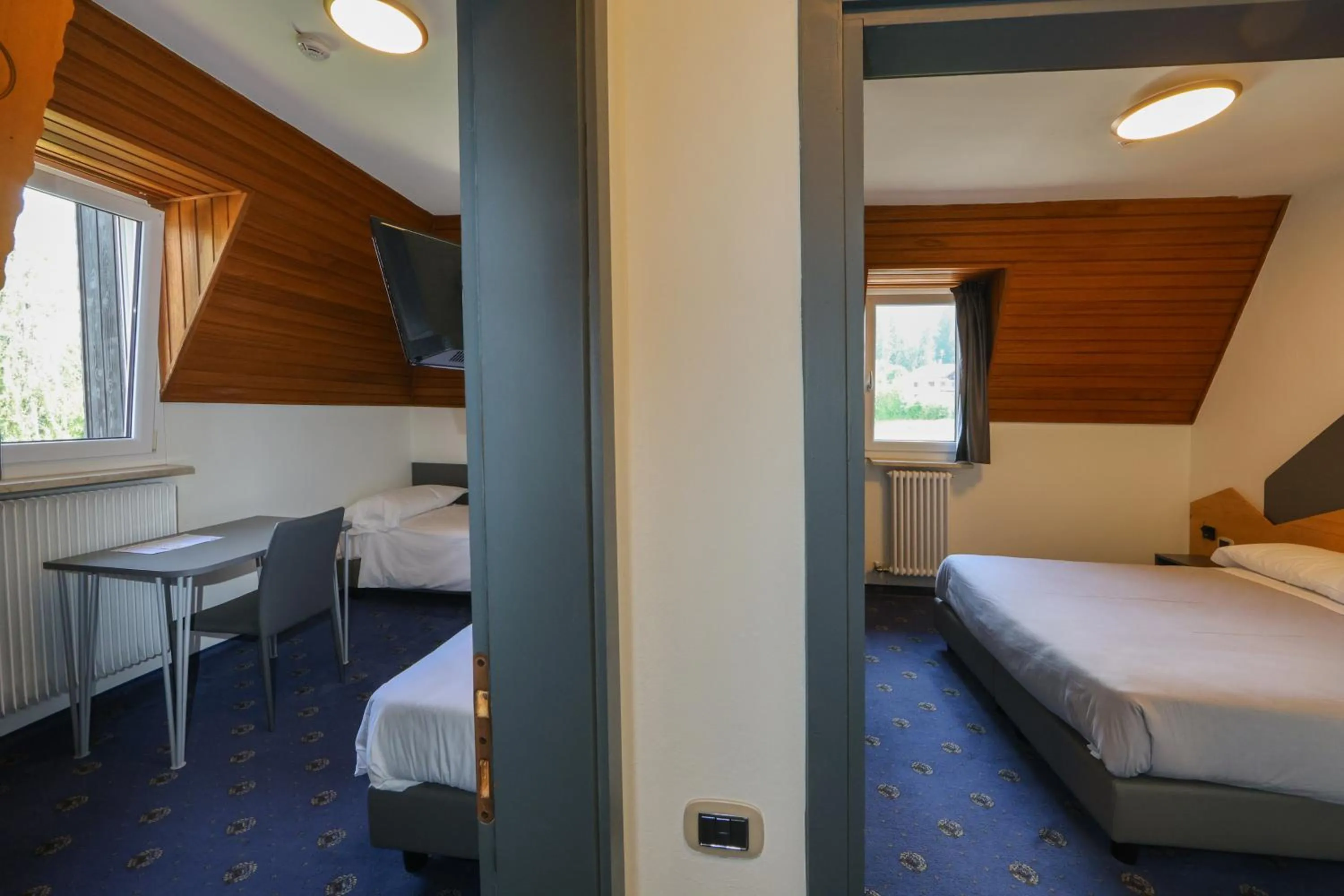 Bed in Hotel Regina del Bosco