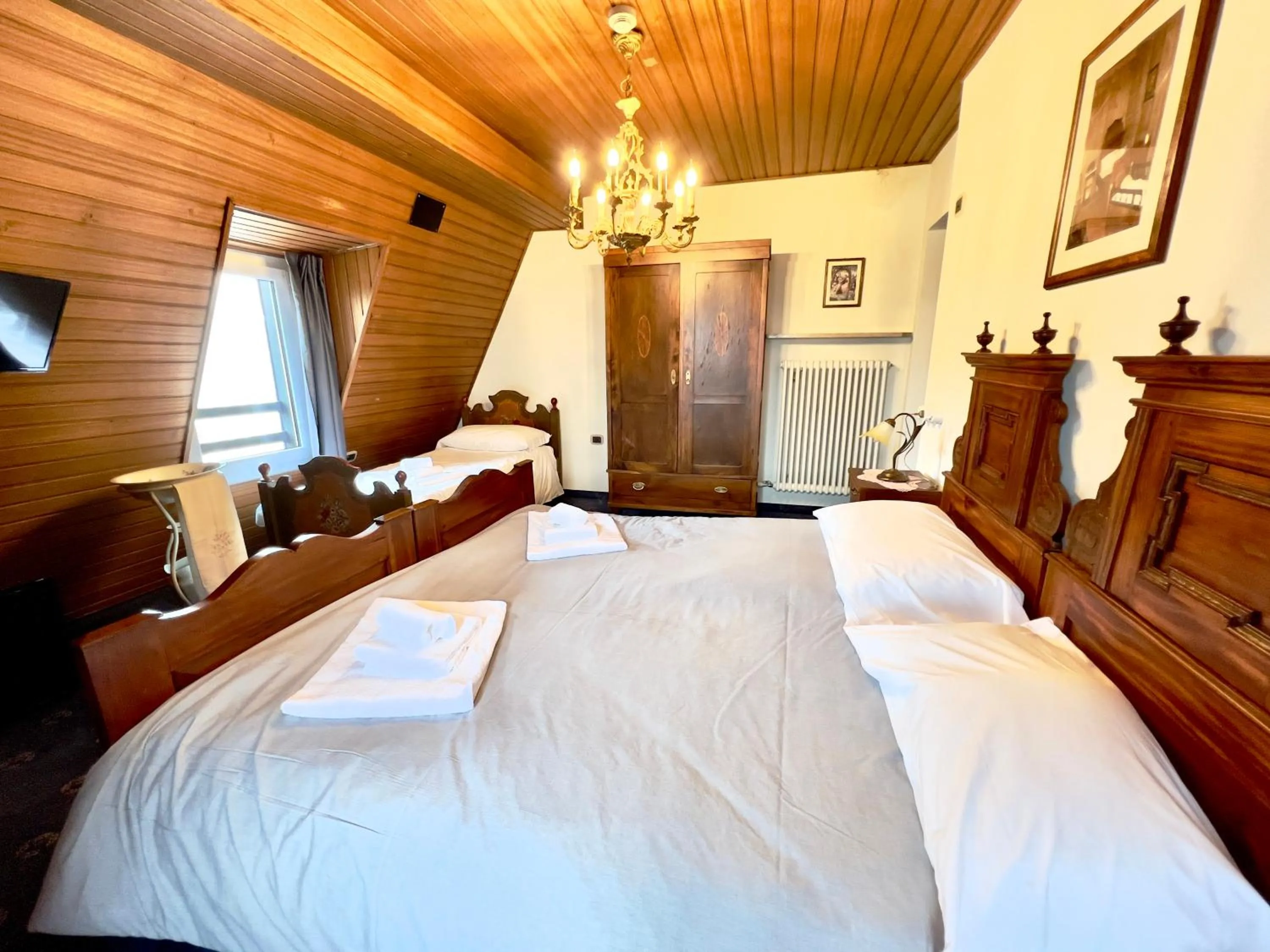 Bed in Hotel Regina del Bosco