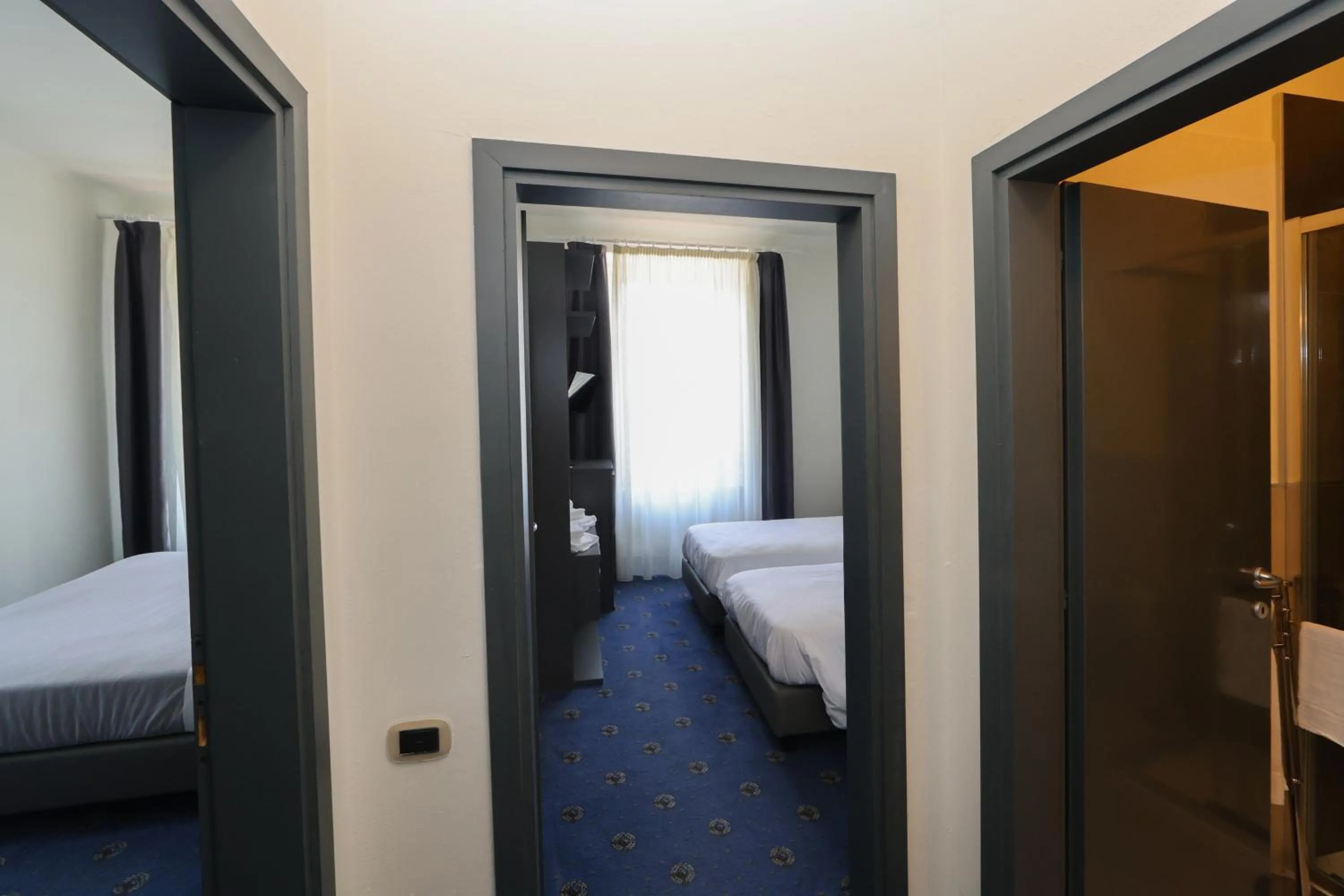 Bed in Hotel Regina del Bosco