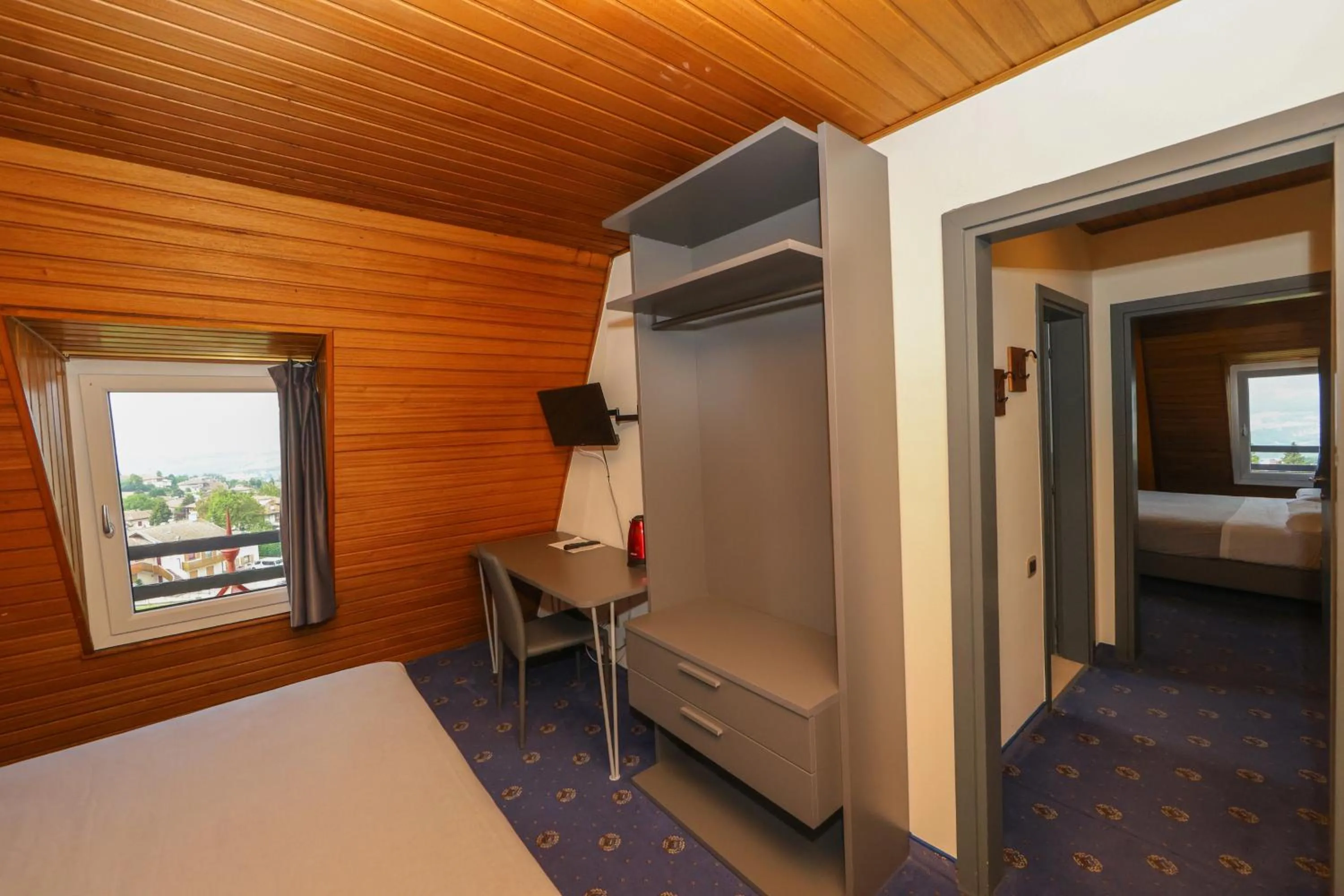 Bed in Hotel Regina del Bosco