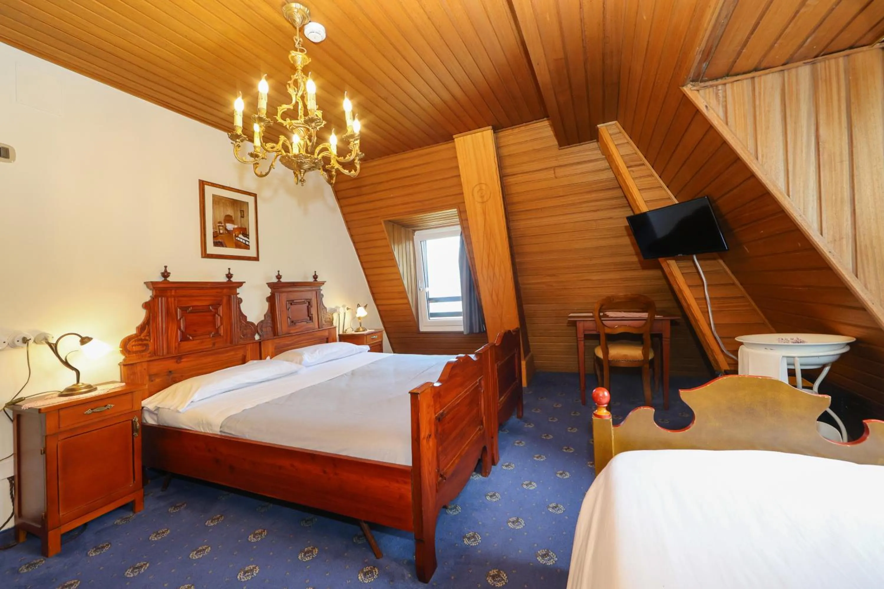 Bed in Hotel Regina del Bosco