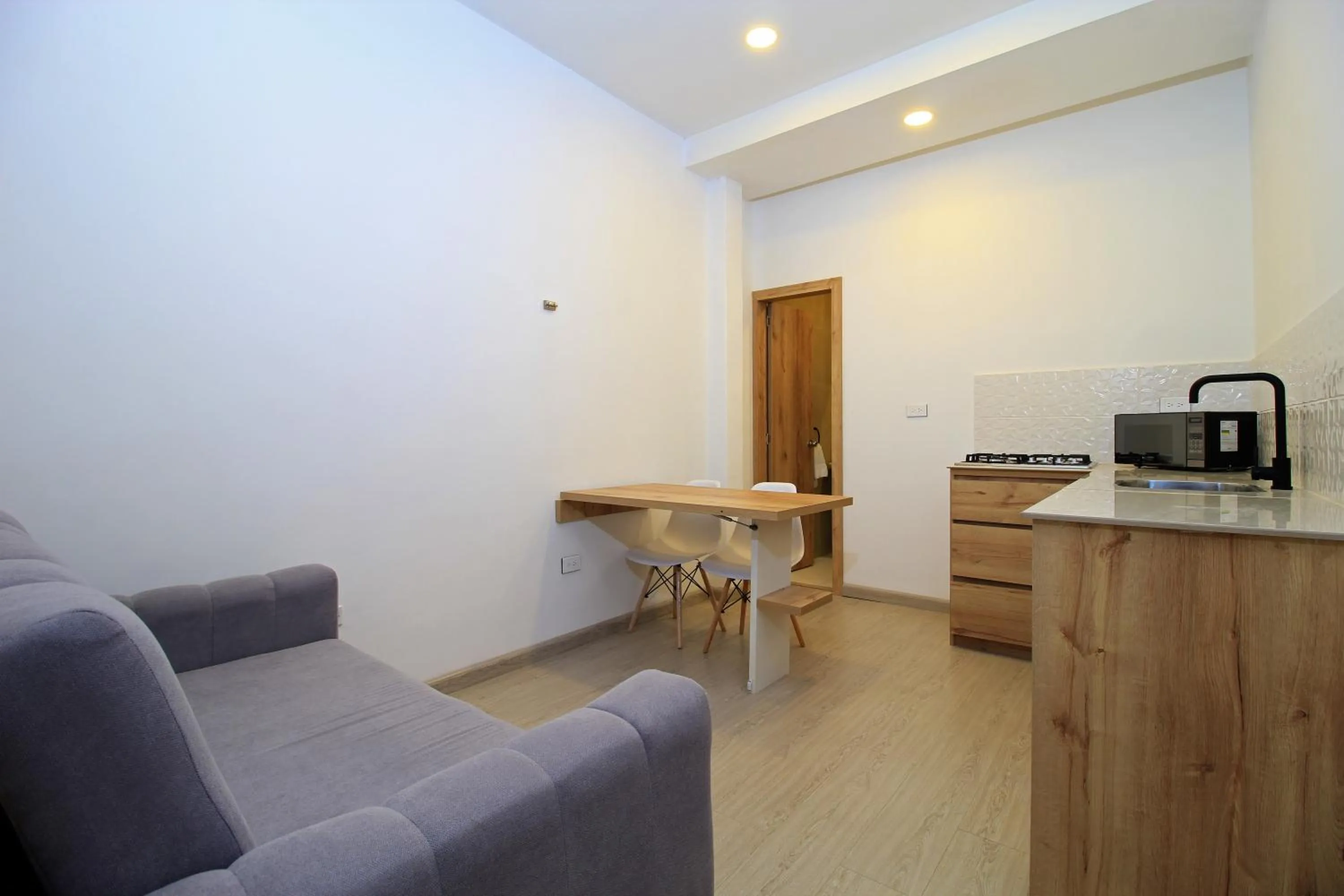 Kitchen or kitchenette in Apart Hotel Casa Blanca