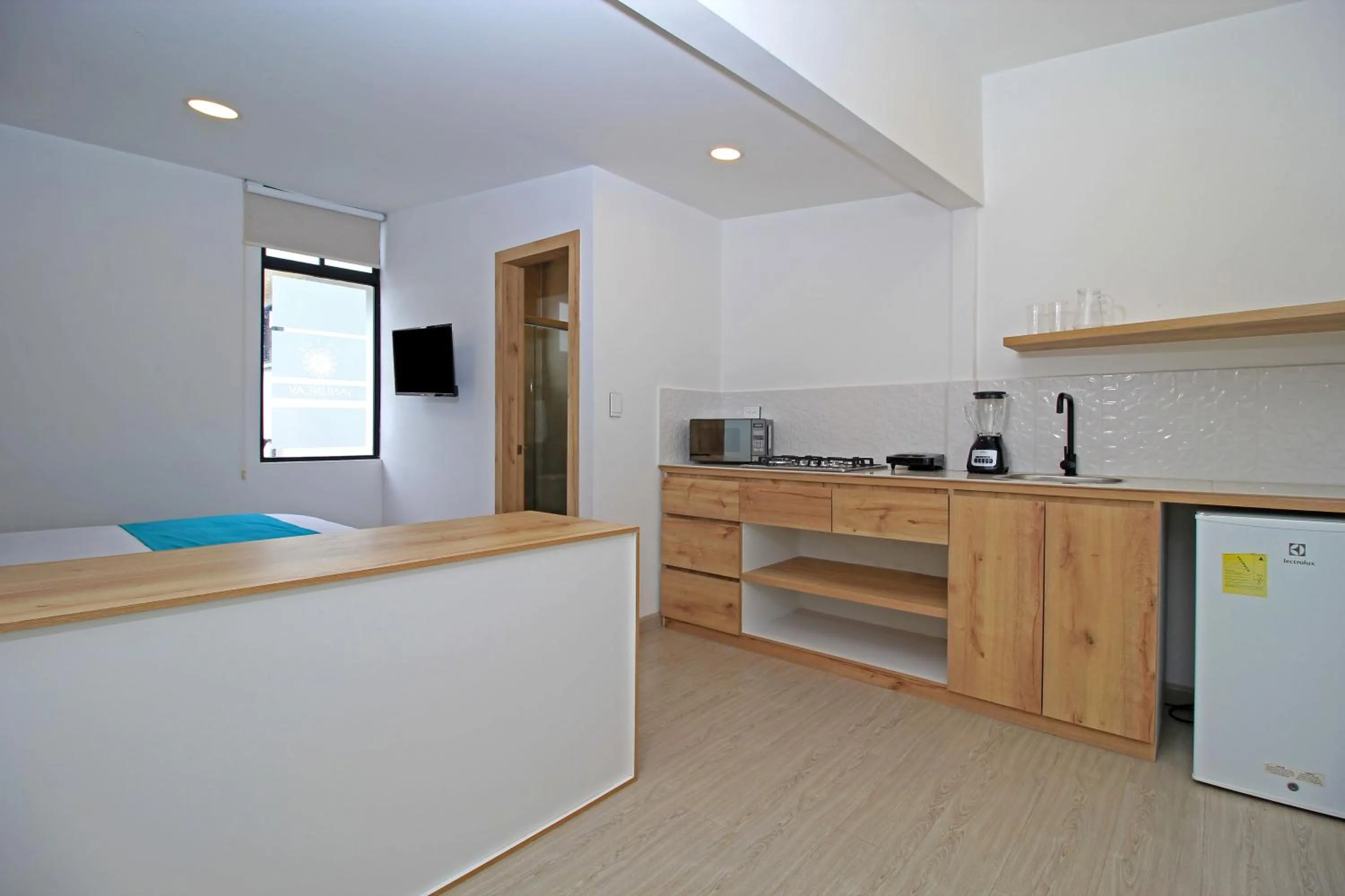 Bed in Apart Hotel Casa Blanca