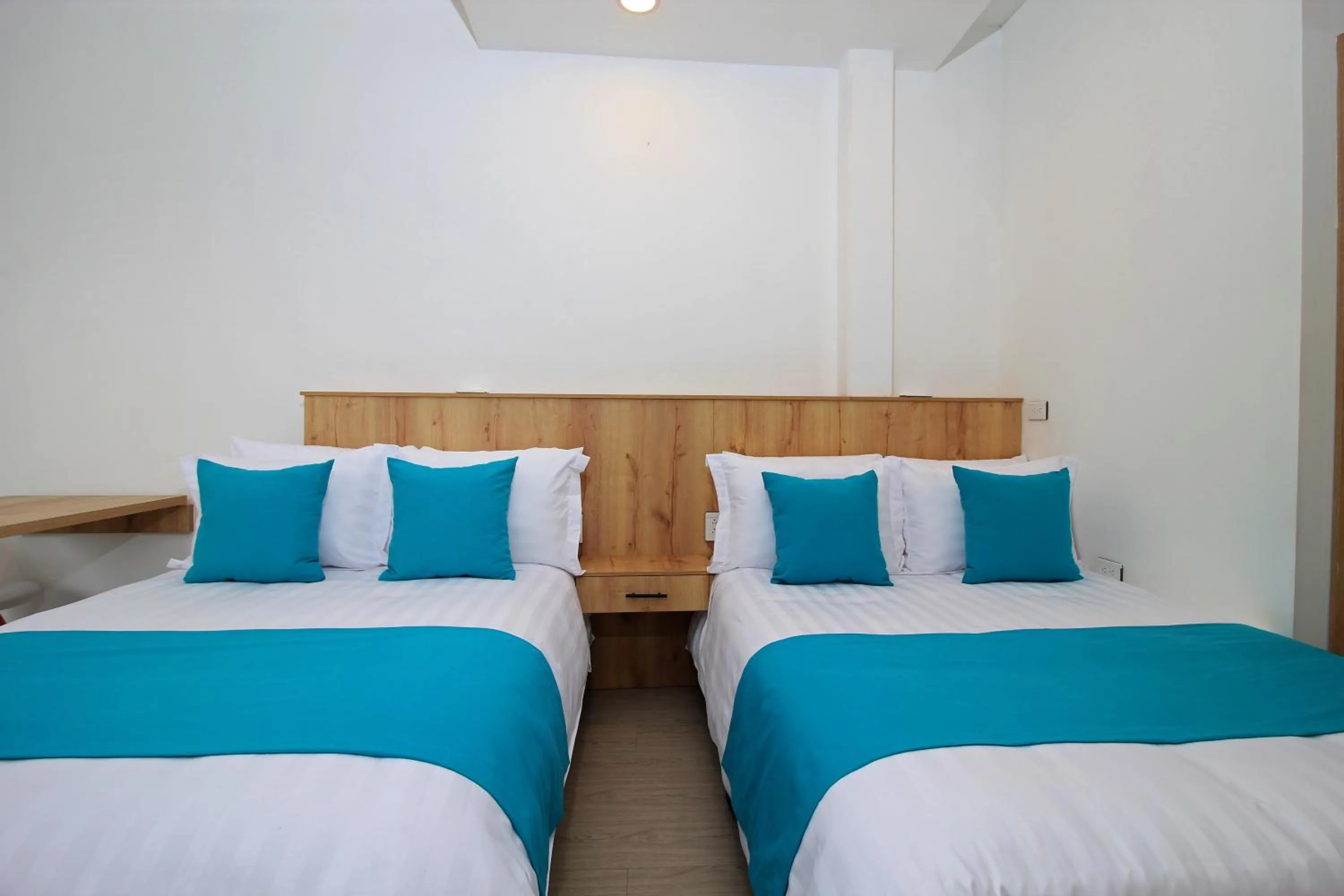 Bed in Apart Hotel Casa Blanca