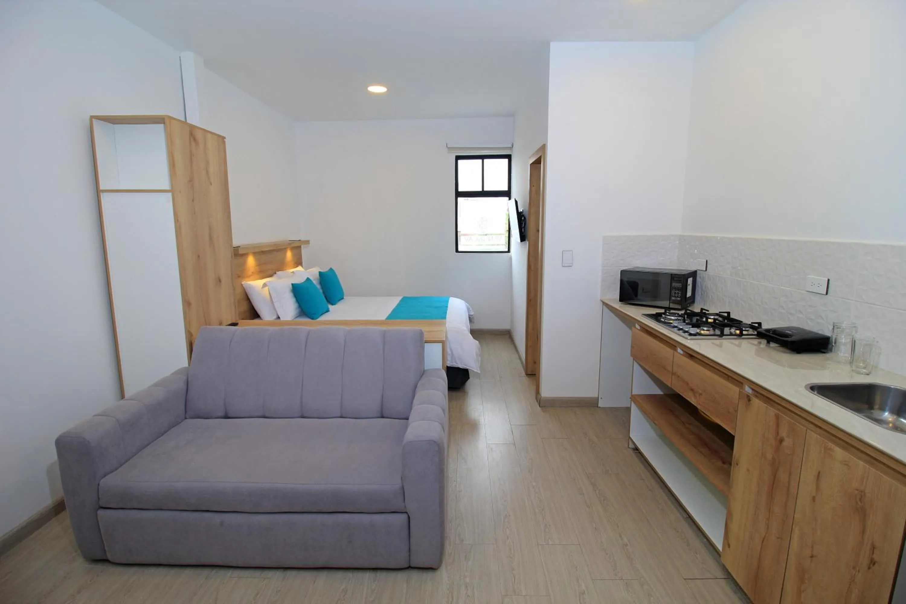 Kitchen or kitchenette in Apart Hotel Casa Blanca