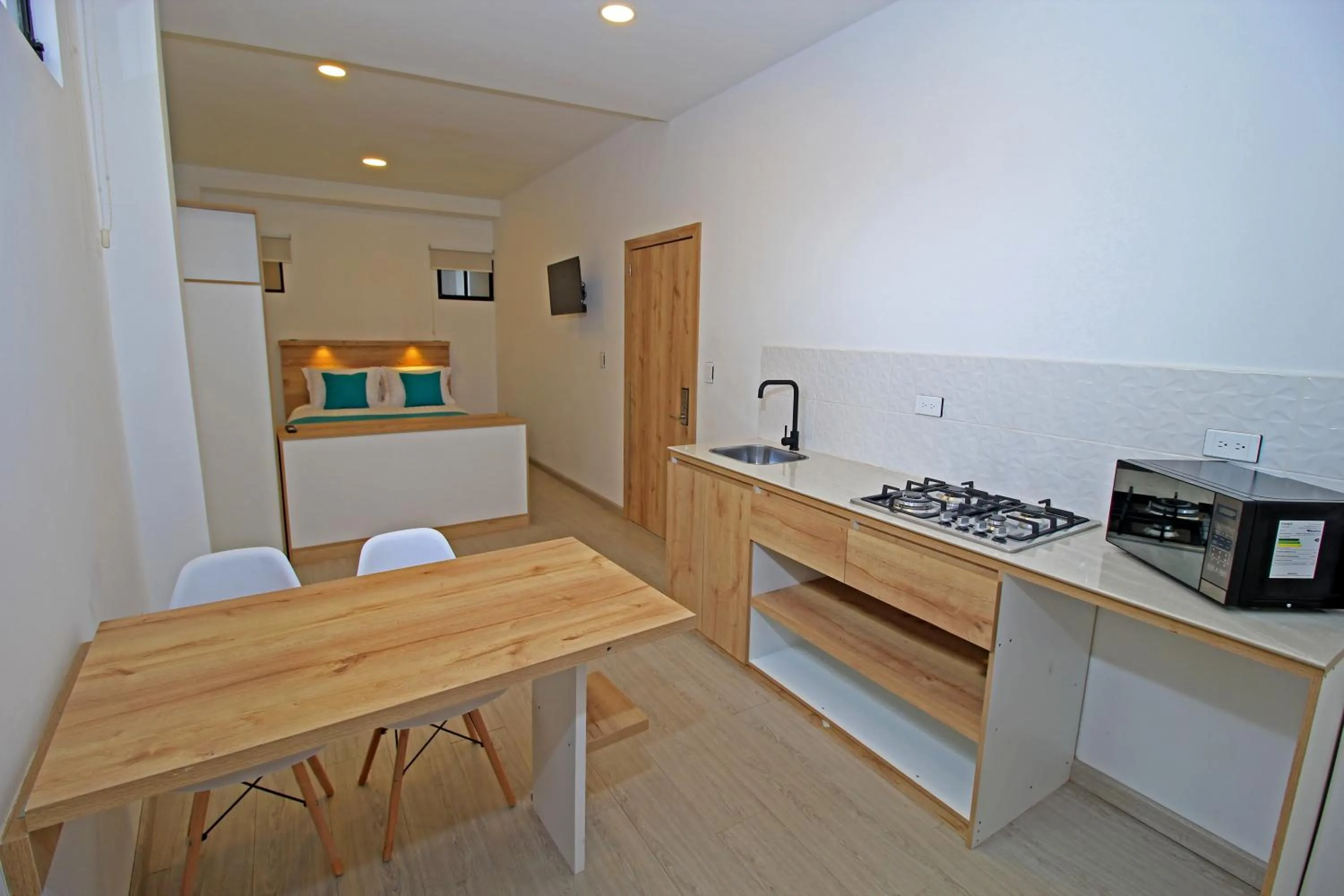 Kitchen or kitchenette in Apart Hotel Casa Blanca