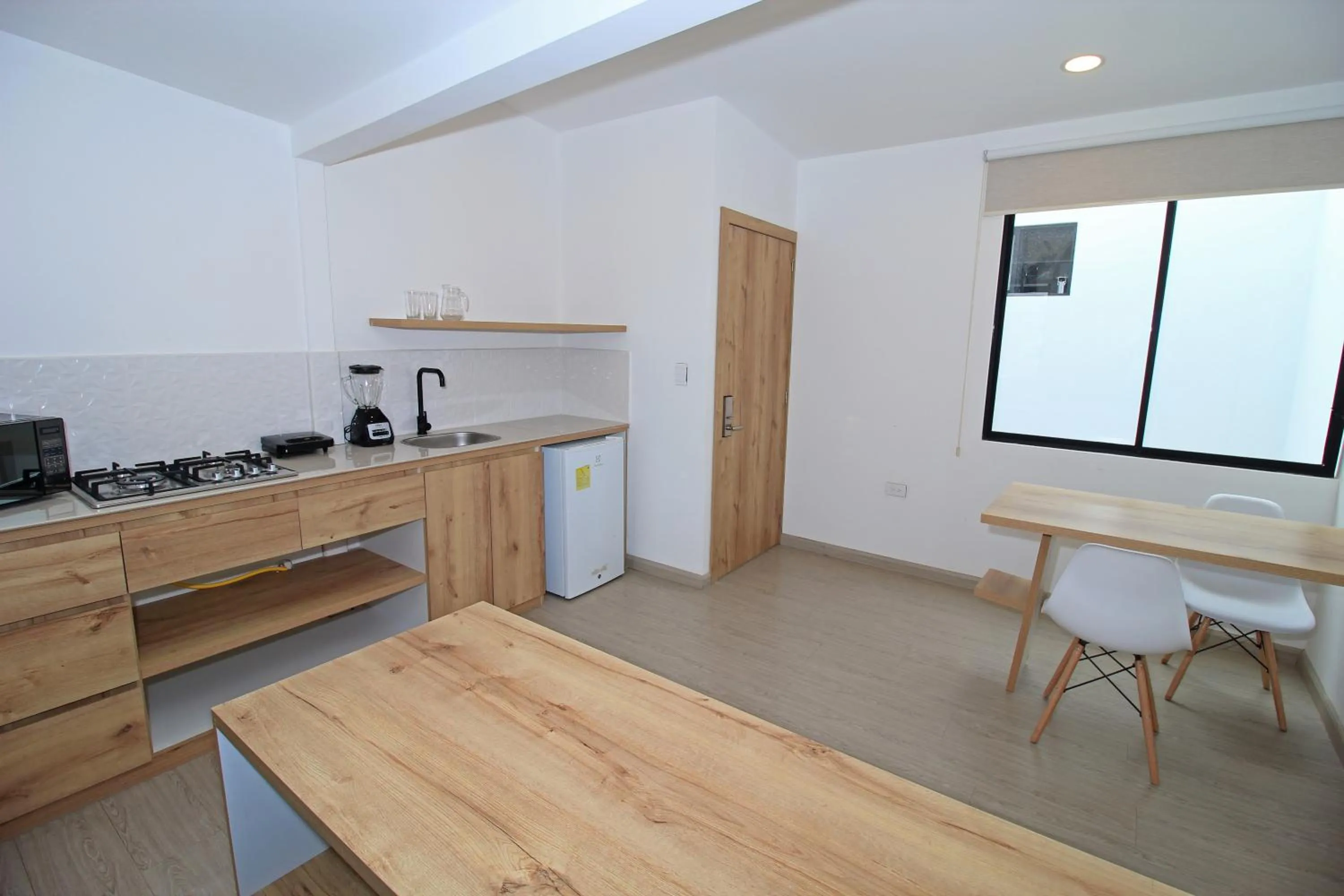 Kitchen or kitchenette in Apart Hotel Casa Blanca