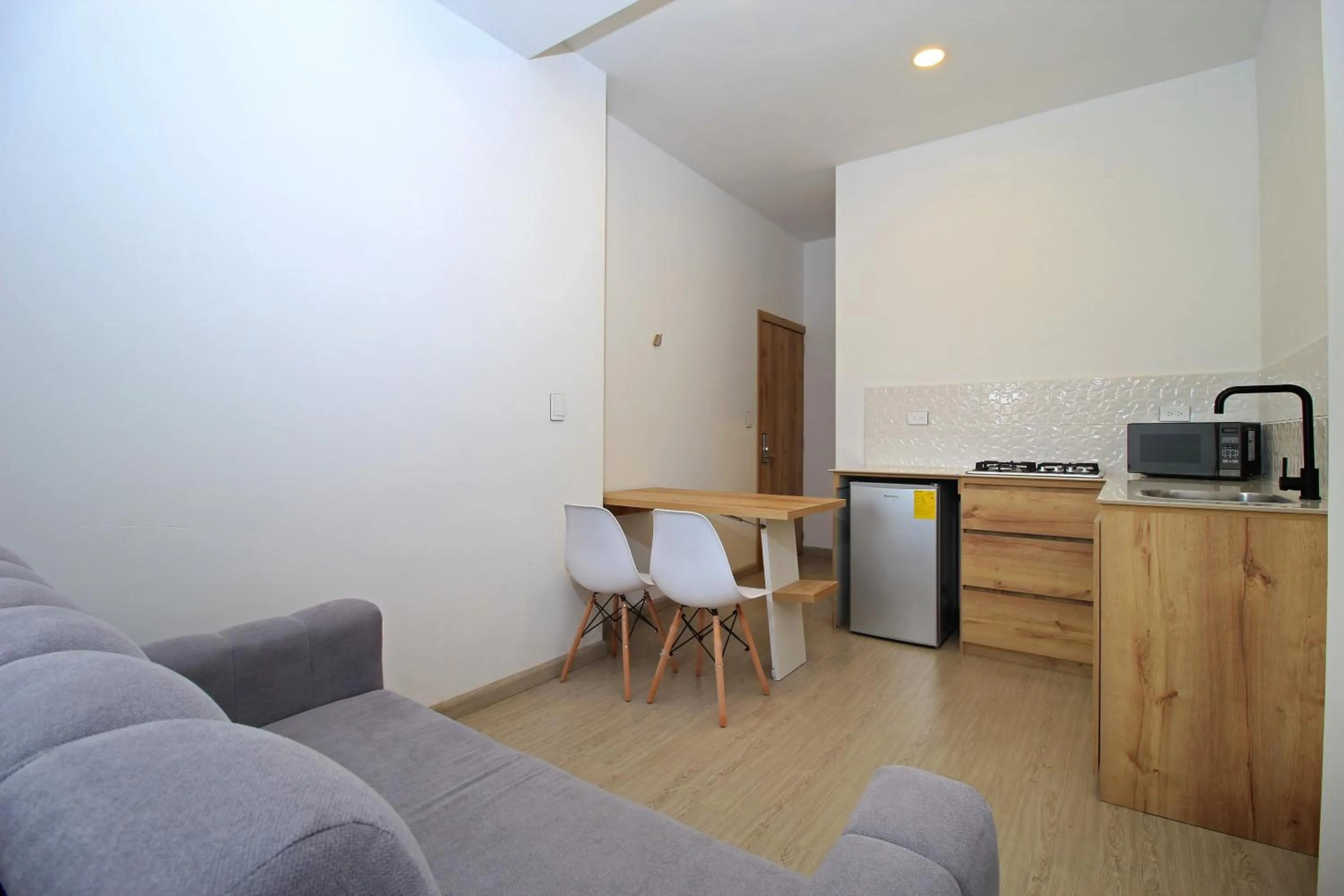 Kitchen or kitchenette in Apart Hotel Casa Blanca